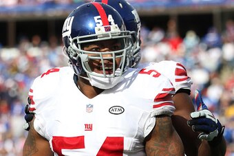 ORCHARD PARK, NY - OCTOBER 04: Jonathan Casillas #54 of the New York Giants looks on during the second half against the Buffalo Bills at Ralph Wilson Stadium on October 04, 2015 in Orchard Park, New York. (Photo by Jerome Davis/Getty Images)