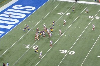 "Wide receiver" Tavon Austin takes a hand off for a 13-yard gain out of the pistol formation.
