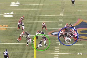 Nick Foles fakes the hand off to Todd Gurley and flips the ball to Tavon Austin as he sweeps through the backfield. Notice Jared Cook; he's positioning himself to lead-block around the right side.