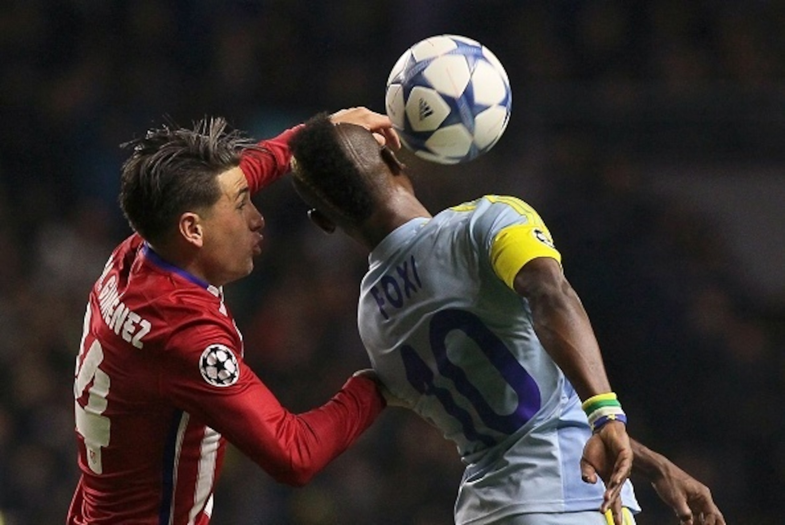 Atletico Madrid's Uruguayan defender Jose Maria Gimenez (L) vies for the ball with Astana's midfielder from the Central Africa Republic Foxi Kethevoama during the UEFA Champions League group C football match between FC Astana and Club Atletico de Madrid a Atletico Madrid's Uruguayan defender Jose Maria Gimenez (L) vies for the ball with Astana's midfielder from the Central Africa Republic Foxi Kethevoama during the UEFA Champions League group C football match between FC Astana and Club Atletico de Madrid a
