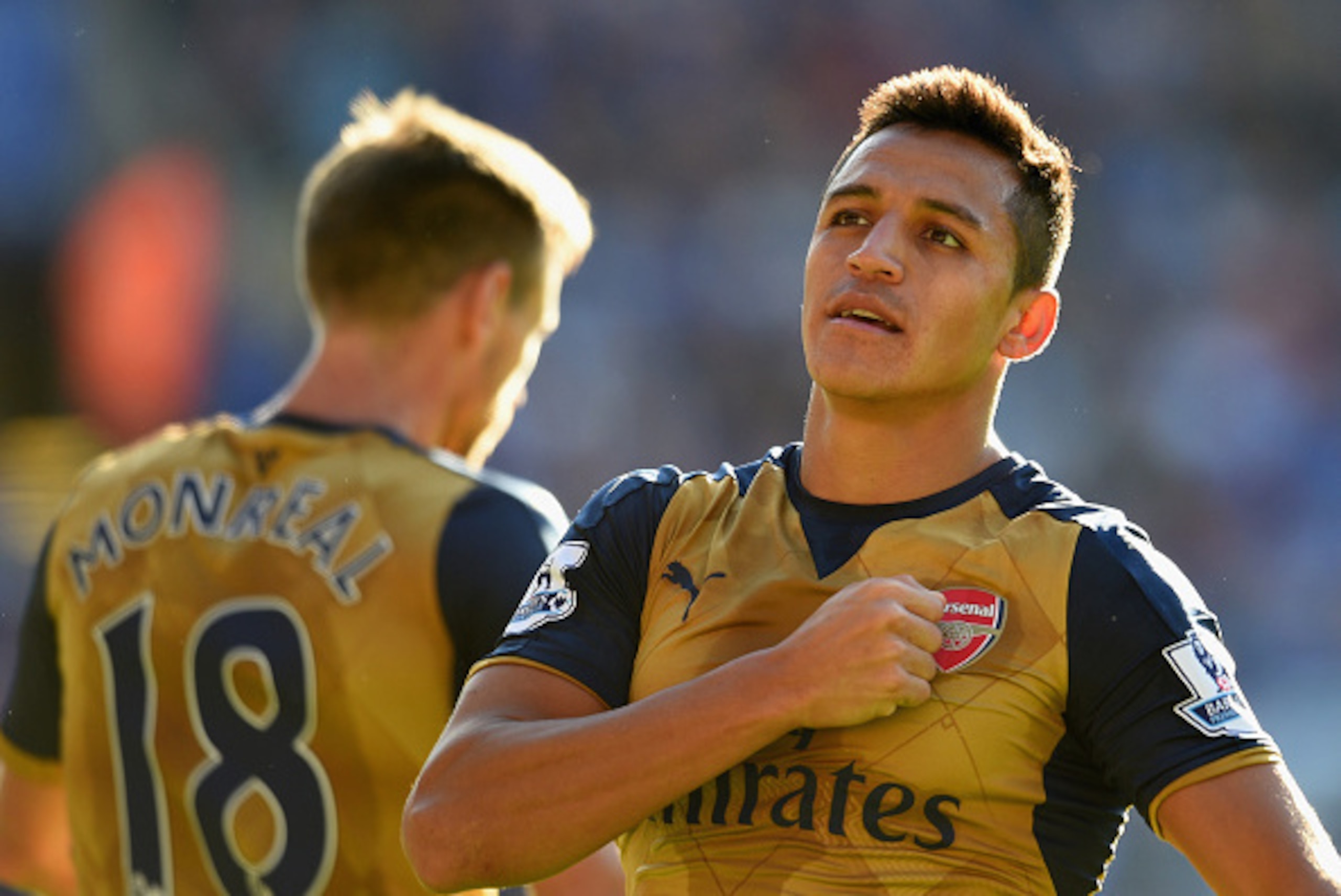 LEICESTER, ENGLAND - SEPTEMBER 26: Alexis Sanchez of Arsenal celebrates scoring his team's fourth and his hat trick goal during the Barclays Premier League match between Leicester City and Arsenal at The King Power Stadium on September 26, 2015 in Leices LEICESTER, ENGLAND - SEPTEMBER 26: Alexis Sanchez of Arsenal celebrates scoring his team's fourth and his hat trick goal during the Barclays Premier League match between Leicester City and Arsenal at The King Power Stadium on September 26, 2015 in Leices