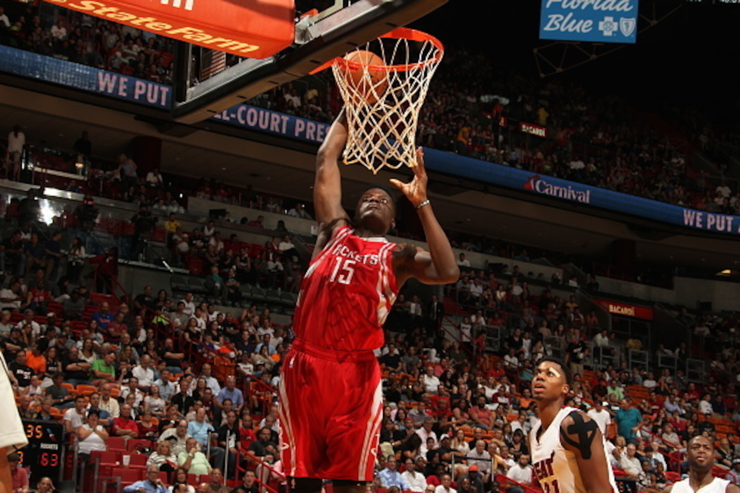 MIAMI, FL - NOVEMBER 1: Clint Capela #15 of the Houston Rockets goes for the layup against the Miami Heat during the game on November 1, 2015 at American Airlines Arena in Miami, Florida. NOTE TO USER: User expressly acknowledges and agrees that, by downl