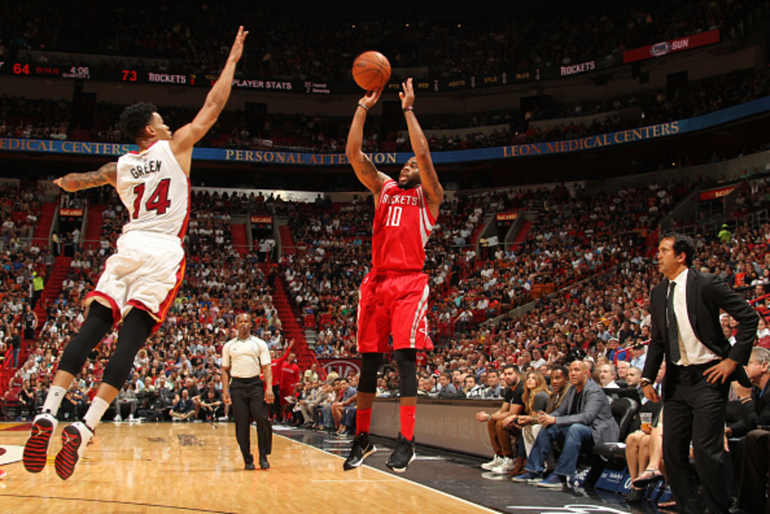 MIAMI, FL - NOVEMBER 1: Gerald Green #14 of the Miami Heat shoots against the Marcus Thornton #10 of the Houston Rockets during the game on November 1, 2015 at American Airlines Arena in Miami, Florida. NOTE TO USER: User expressly acknowledges and agrees