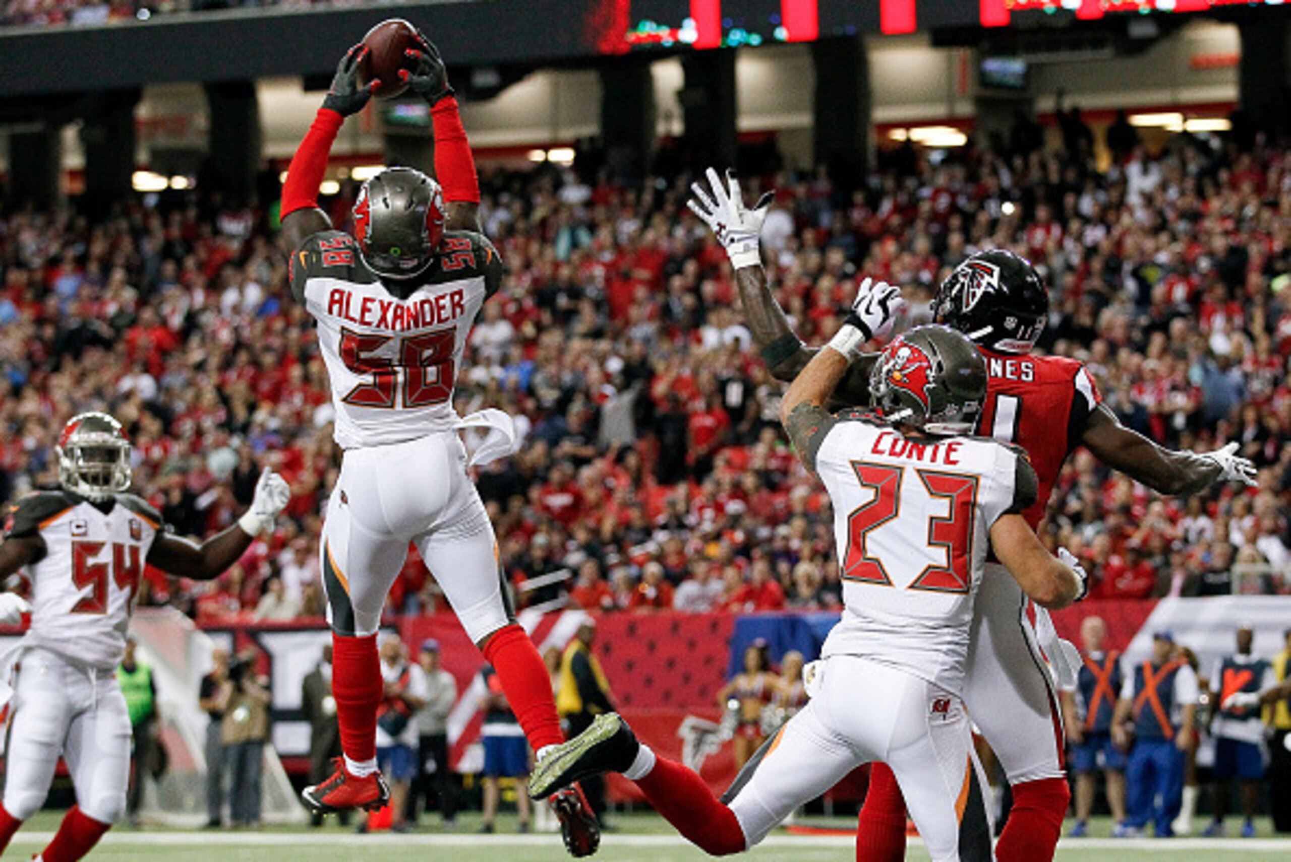 TAMPA, FL - NOVEMBER 1: Linebacker Kwon Alexander #58 of the Tampa Bay Buccaneers intercepts a pass in the end zone during the game against the Atlanta Falcons at the Georiga Dome on November 1, 2015 in Atlanta, Georgia. The Buccaneers defeated the Falcon
