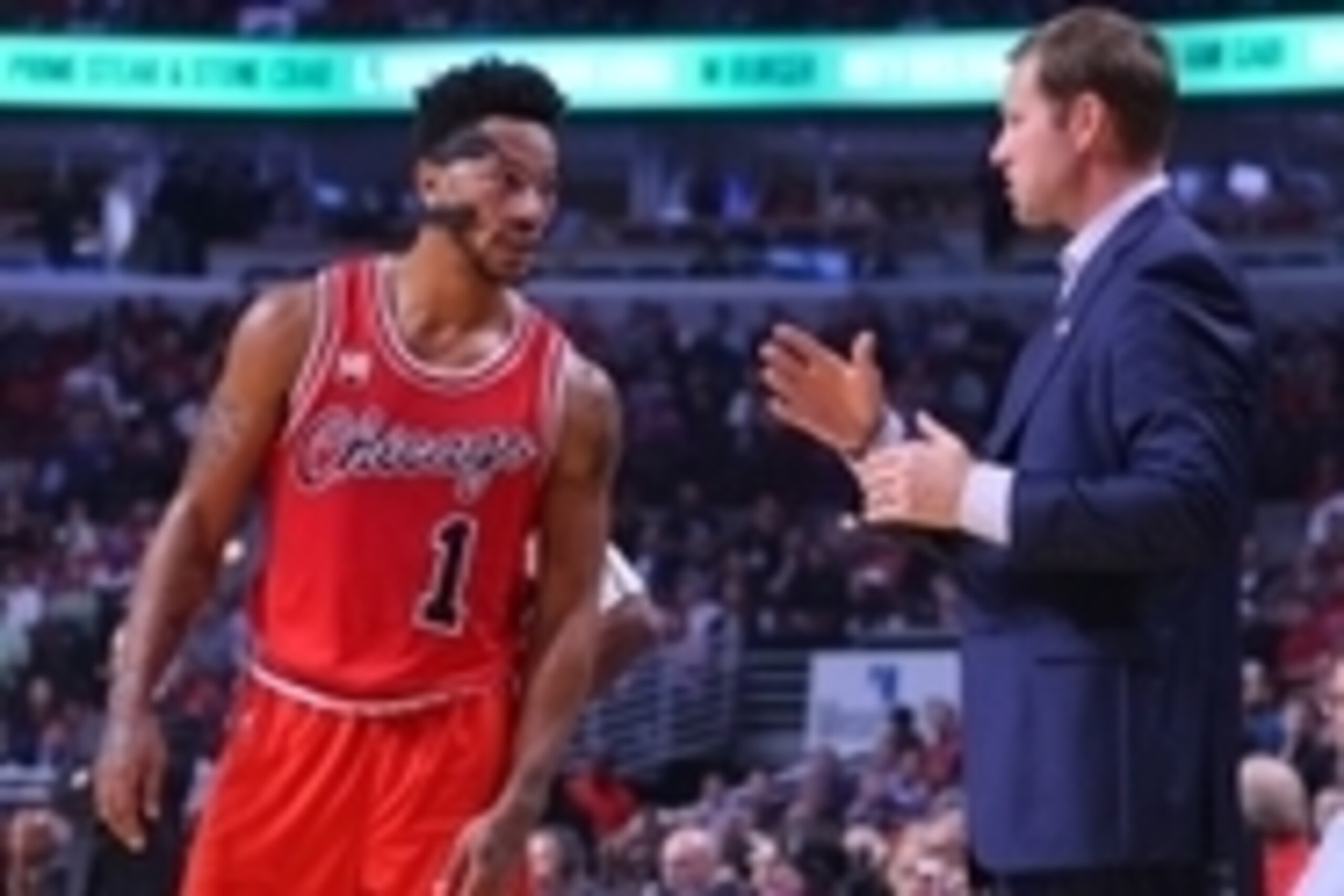 Nov 5, 2015; Chicago, IL, USA; Chicago Bulls head coach Fred Hoiberg (R) talks to guard Derrick Rose (1) during the first half against the Oklahoma City Thunder at the United Center. Mandatory Credit: Dennis Wierzbicki-USA TODAY Sports