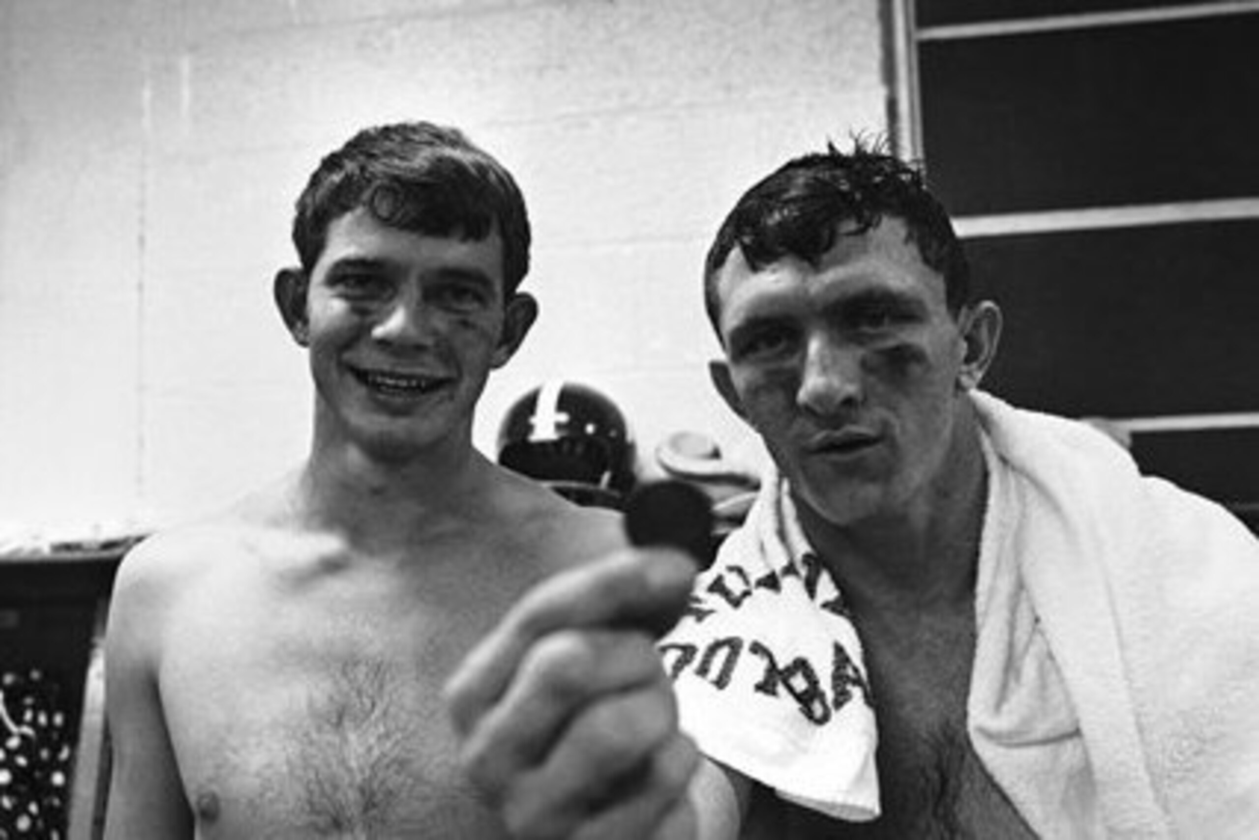 Kenny Stabler and Bob Perkins in the Alabama locker room after a victory.