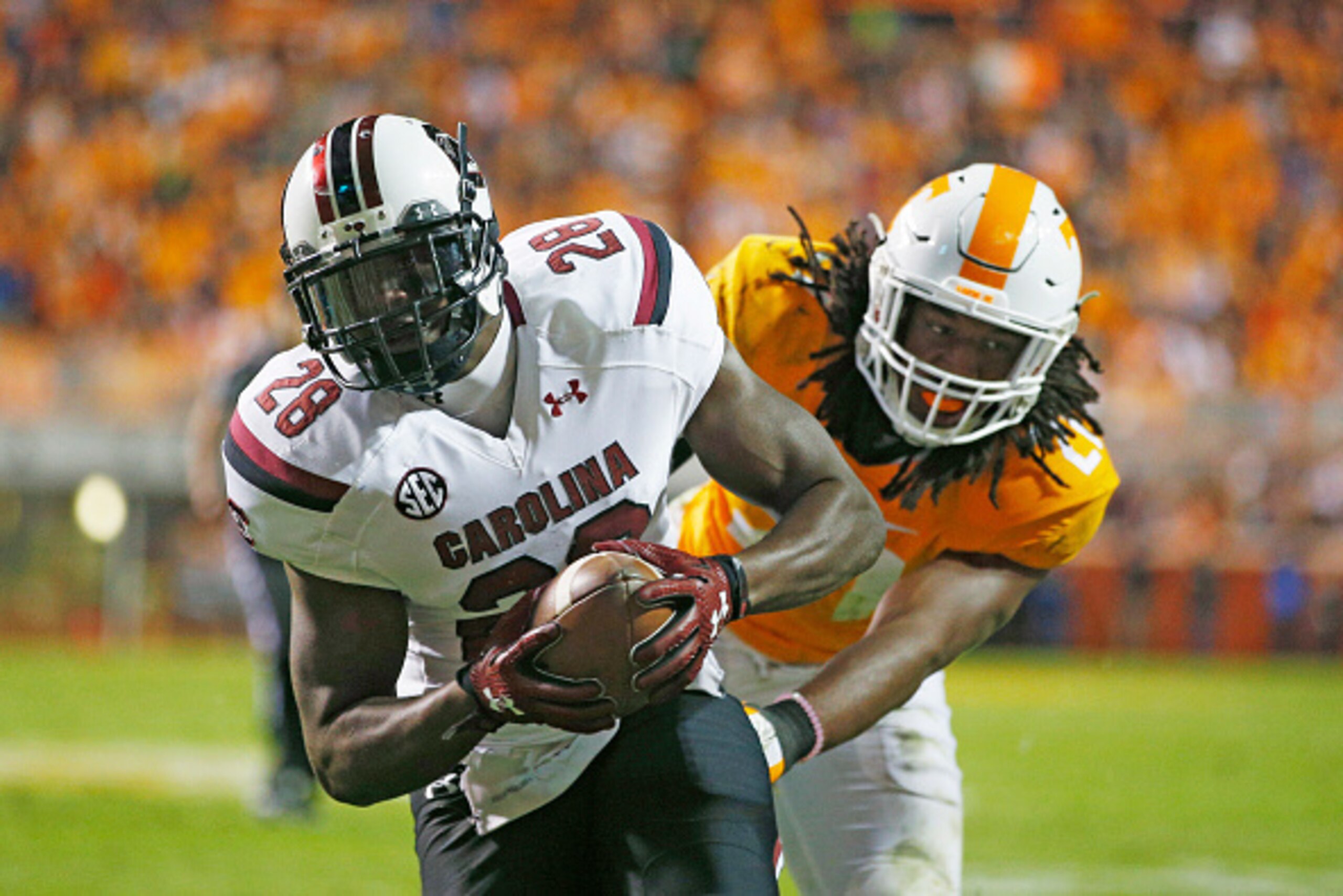 KNOXVILLE, TN - NOVEMBER 7: Jonathan Walton #28 of the South Carolina Gamecocks scores a touchdown on a 10-yard reception in the third quarter of a game against the Tennessee Volunteers at Neyland Stadium on November 7, 2015 in Knoxville, Tennessee. (Phot KNOXVILLE, TN - NOVEMBER 7: Jonathan Walton #28 of the South Carolina Gamecocks scores a touchdown on a 10-yard reception in the third quarter of a game against the Tennessee Volunteers at Neyland Stadium on November 7, 2015 in Knoxville, Tennessee. (Phot