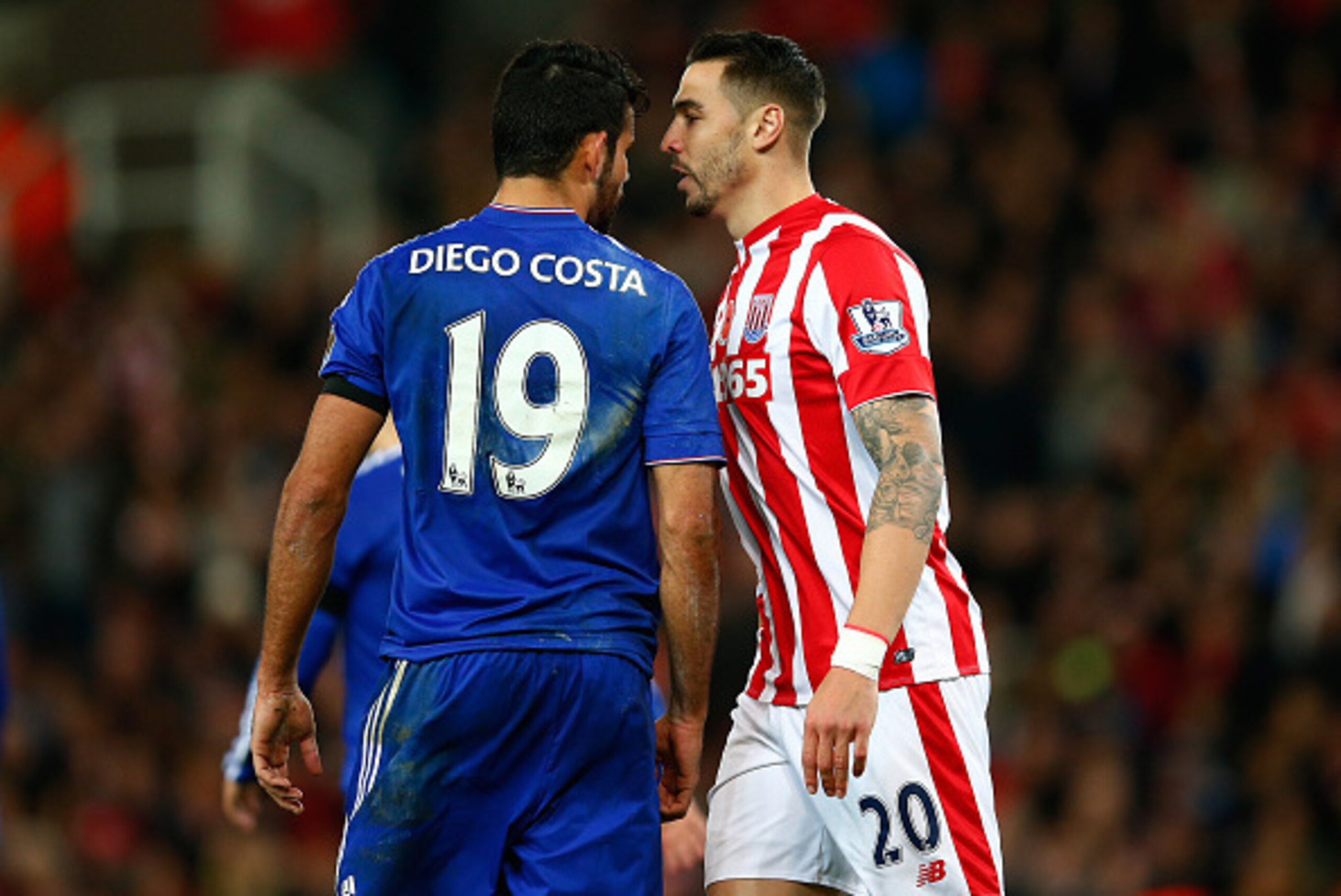 STOKE ON TRENT, ENGLAND - NOVEMBER 07: Diego Costa of Chelsea and Geoff Cameron of Stoke City argue during the Barclays Premier League match between Stoke City and Chelsea at Britannia Stadium on November 7, 2015 in Stoke on Trent, England.  (Photo by Lau