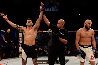 SAO PAULO, BRAZIL - NOVEMBER 07: Viscardi Andrade of Brazil celebrates victory over Gasan Umalatov of Russia in their welterweight bout during UFC Fight Nigth Belfort v Henderson at Ibirapuera Gymnasium on November 7, 2015 in Sao Paulo, Brazil. (Photo by 