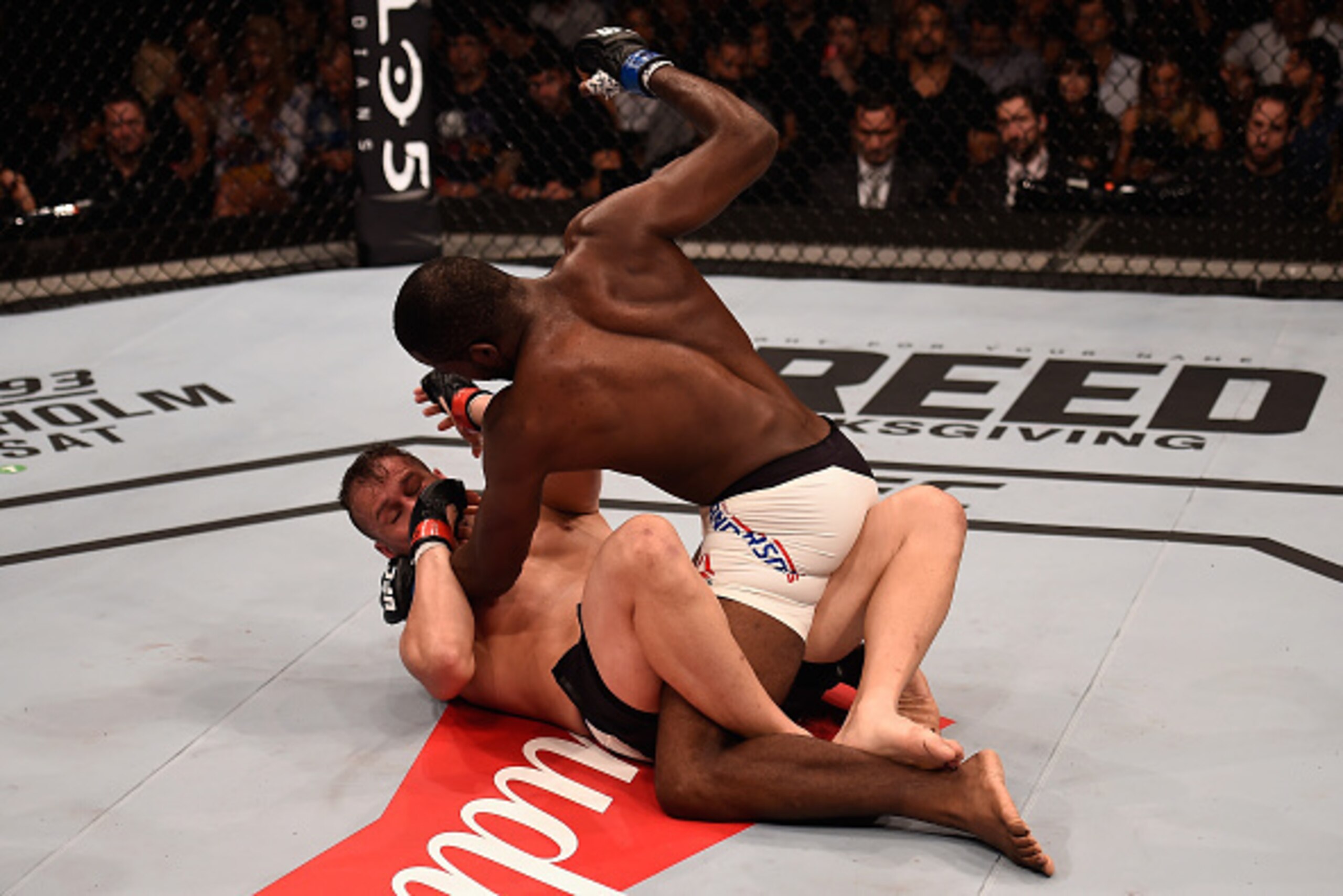SAO PAULO, BRAZIL - NOVEMBER 07:  Corey Anderson of the United States punches Fabio Maldonado of Brazil in their light heavyweight bout   during the UFC Fight Night Belfort v Henderson at Ibirapuera Gymnasium on November 7, 2015 in Sao Paulo, Brazil.  (Ph