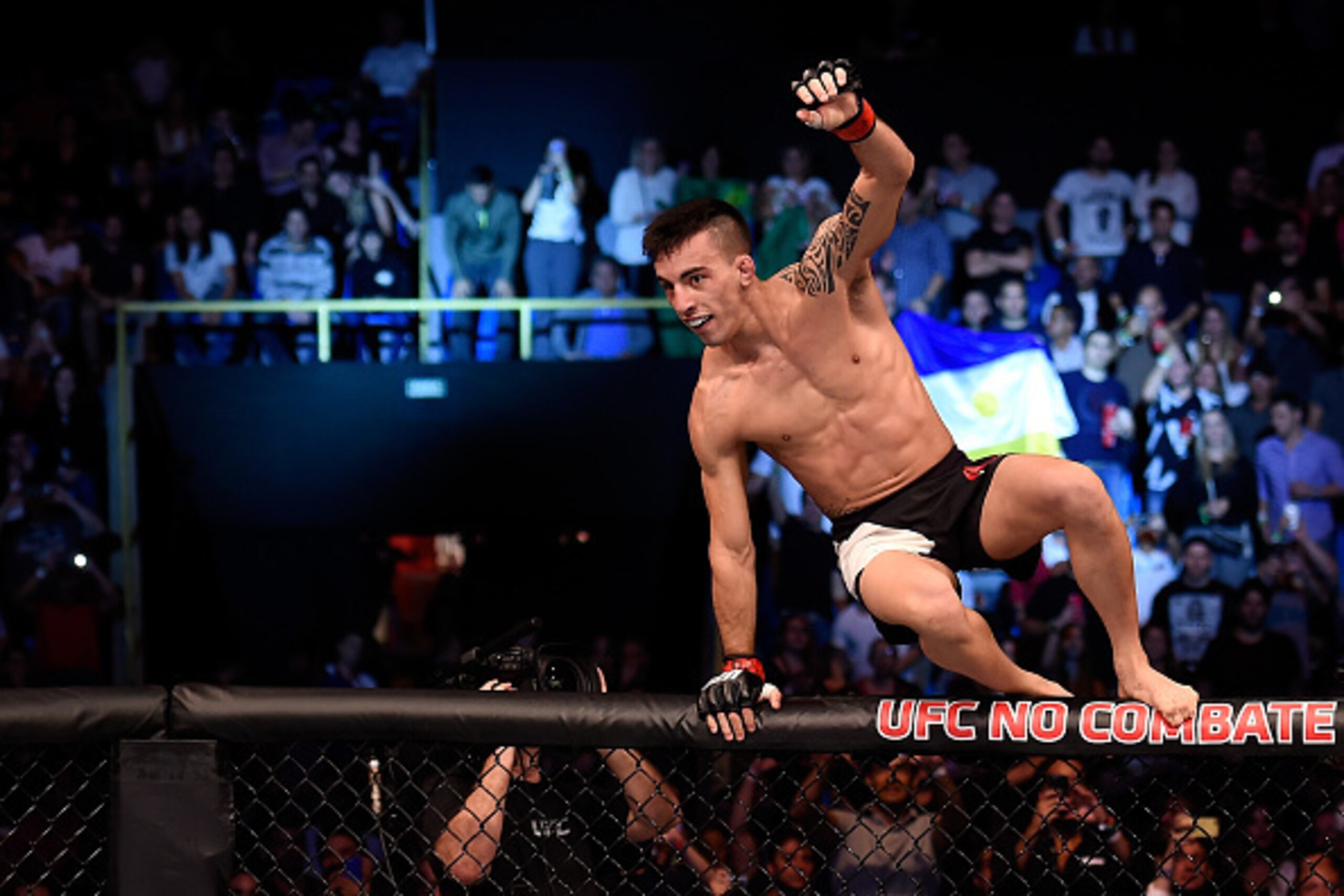 SAO PAULO, BRAZIL - NOVEMBER 07:  Thomas Almeida of Brazil celebrates victory over Anthony Birchak of the United States in their bantamweight bout during the UFC Fight Night Belfort v Henderson at Ibirapuera Gymnasium on November 7, 2015 in Sao Paulo, Bra