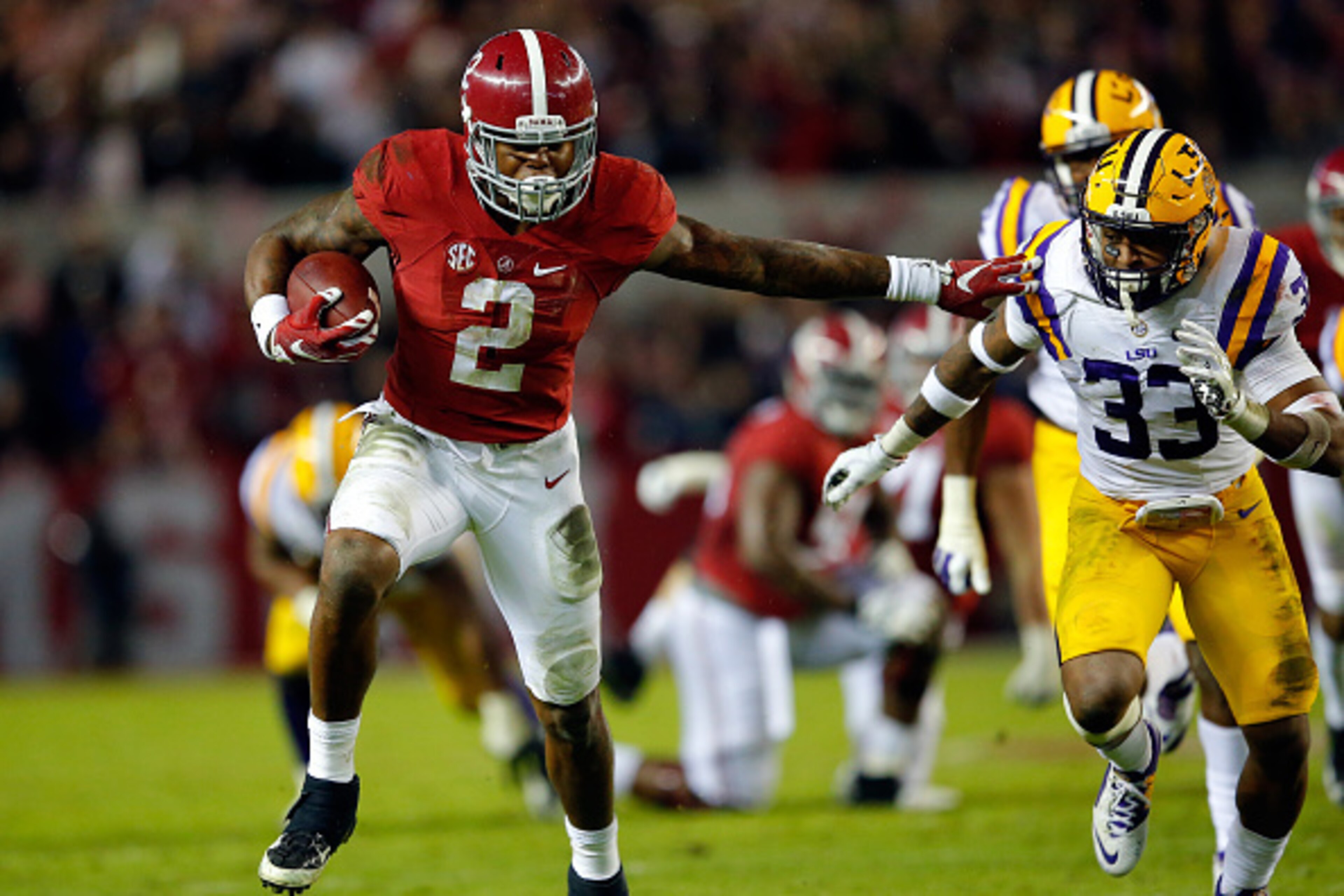 TUSCALOOSA, AL - NOVEMBER 07: Derrick Henry #2 of the Alabama Crimson Tide rushes away from Jamal Adams #33 of the LSU Tigers in the second quarter at Bryant-Denny Stadium on November 7, 2015 in Tuscaloosa, Alabama. (Photo by Kevin C. Cox/Getty Images) TUSCALOOSA, AL - NOVEMBER 07: Derrick Henry #2 of the Alabama Crimson Tide rushes away from Jamal Adams #33 of the LSU Tigers in the second quarter at Bryant-Denny Stadium on November 7, 2015 in Tuscaloosa, Alabama. (Photo by Kevin C. Cox/Getty Images)
