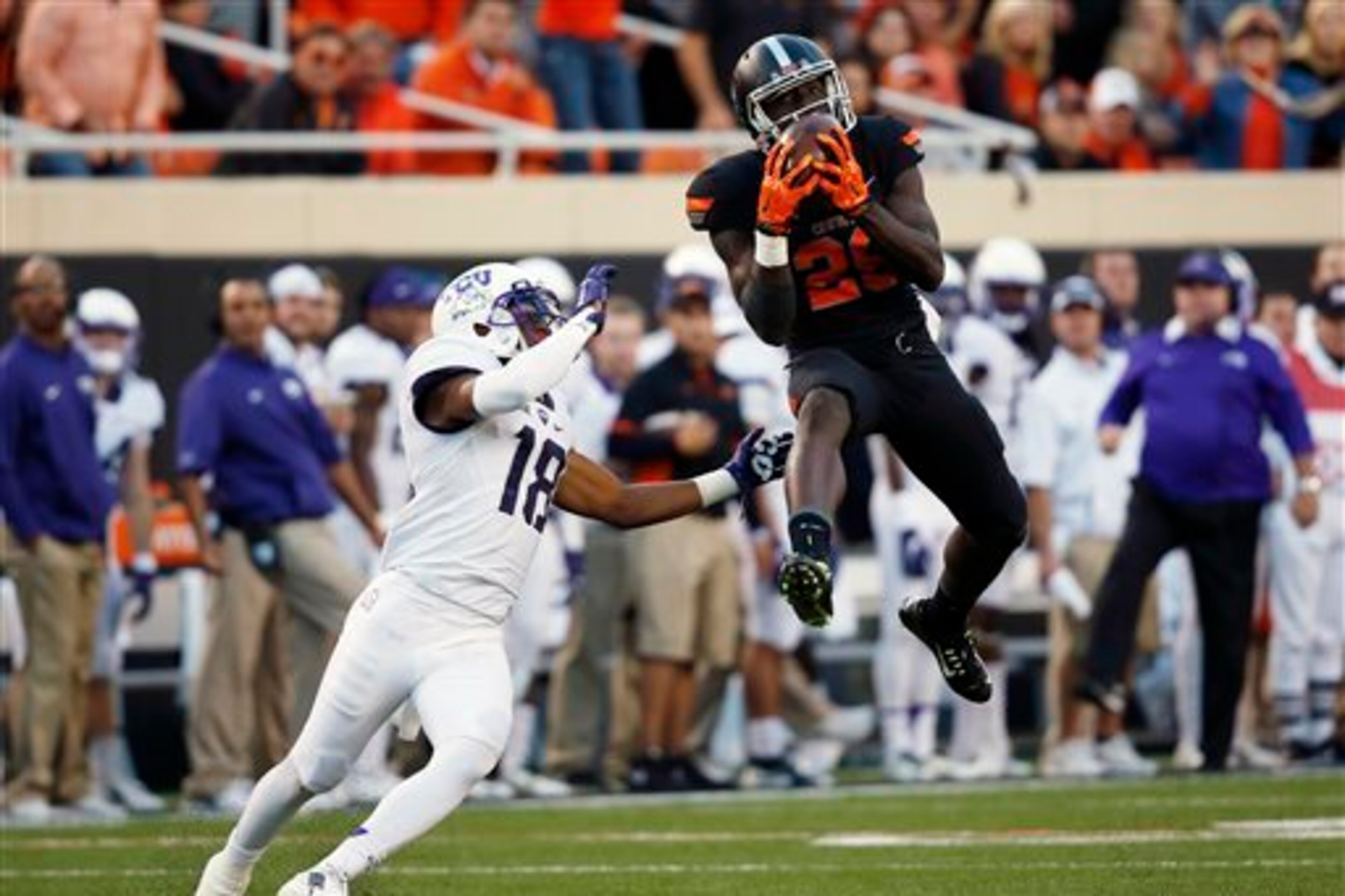 Oklahoma State WR James Washington (right) Oklahoma State WR James Washington (right)