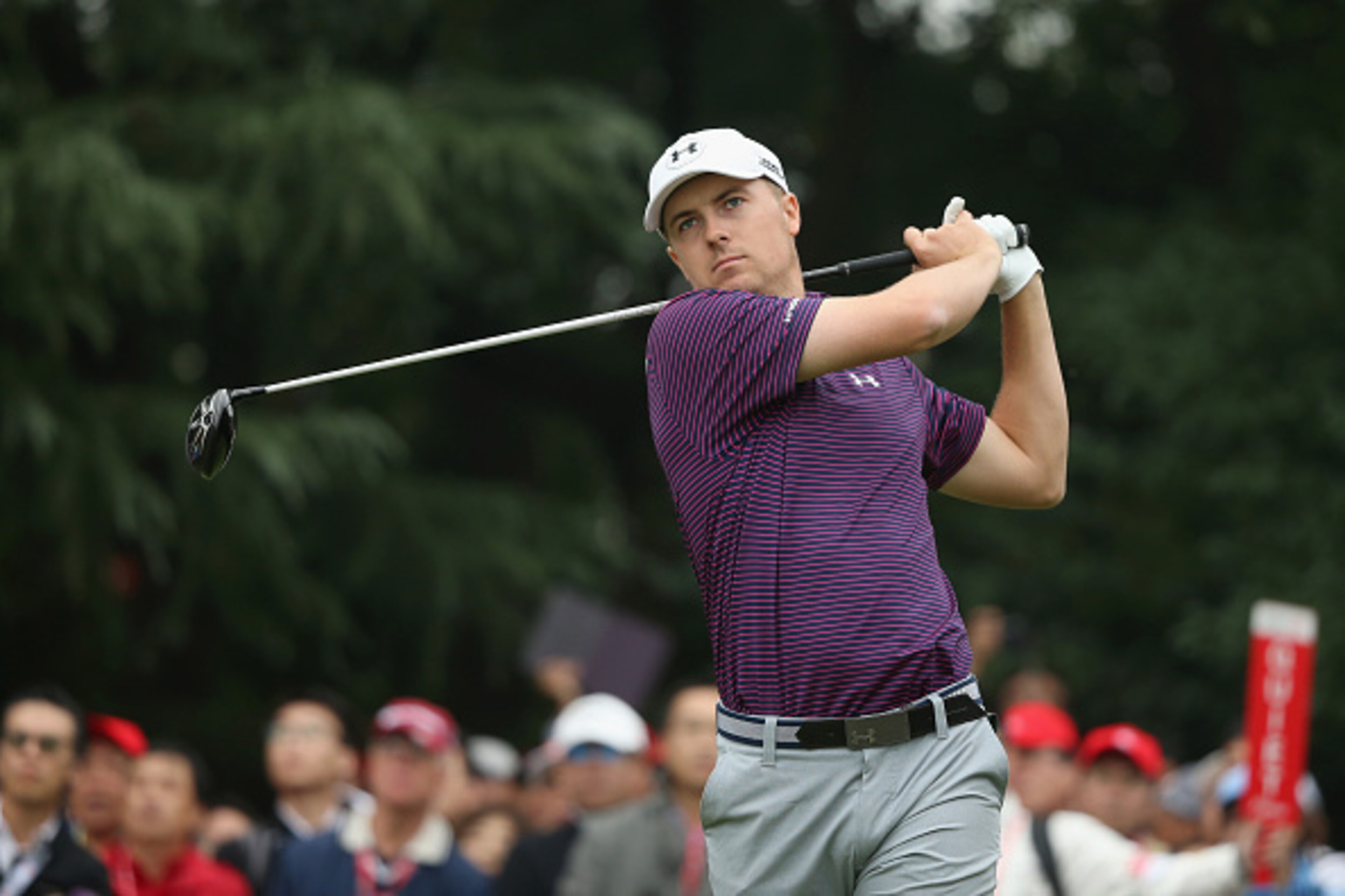 SHANGHAI, CHINA - NOVEMBER 08:  Jordan Spieth of the United States hits his tee shot on the first hole during the final round of the WGC - HSBC Champions at the Sheshan International Golf Club on November 8, 2015 in Shanghai, China.  (Photo by Andrew Redi
