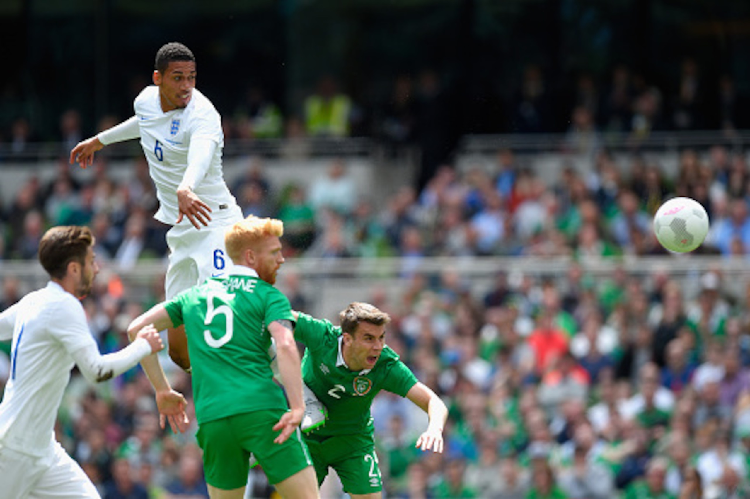 DUBLIN, IRELAND - JUNE 07:  England defender Chris Smalling (l) rises highest to head at goal during the International friendly match between Ireland and England at Aviva Stadium on June 7, 2015 in Dublin, Ireland.  (Photo by Stu Forster/Getty Images)