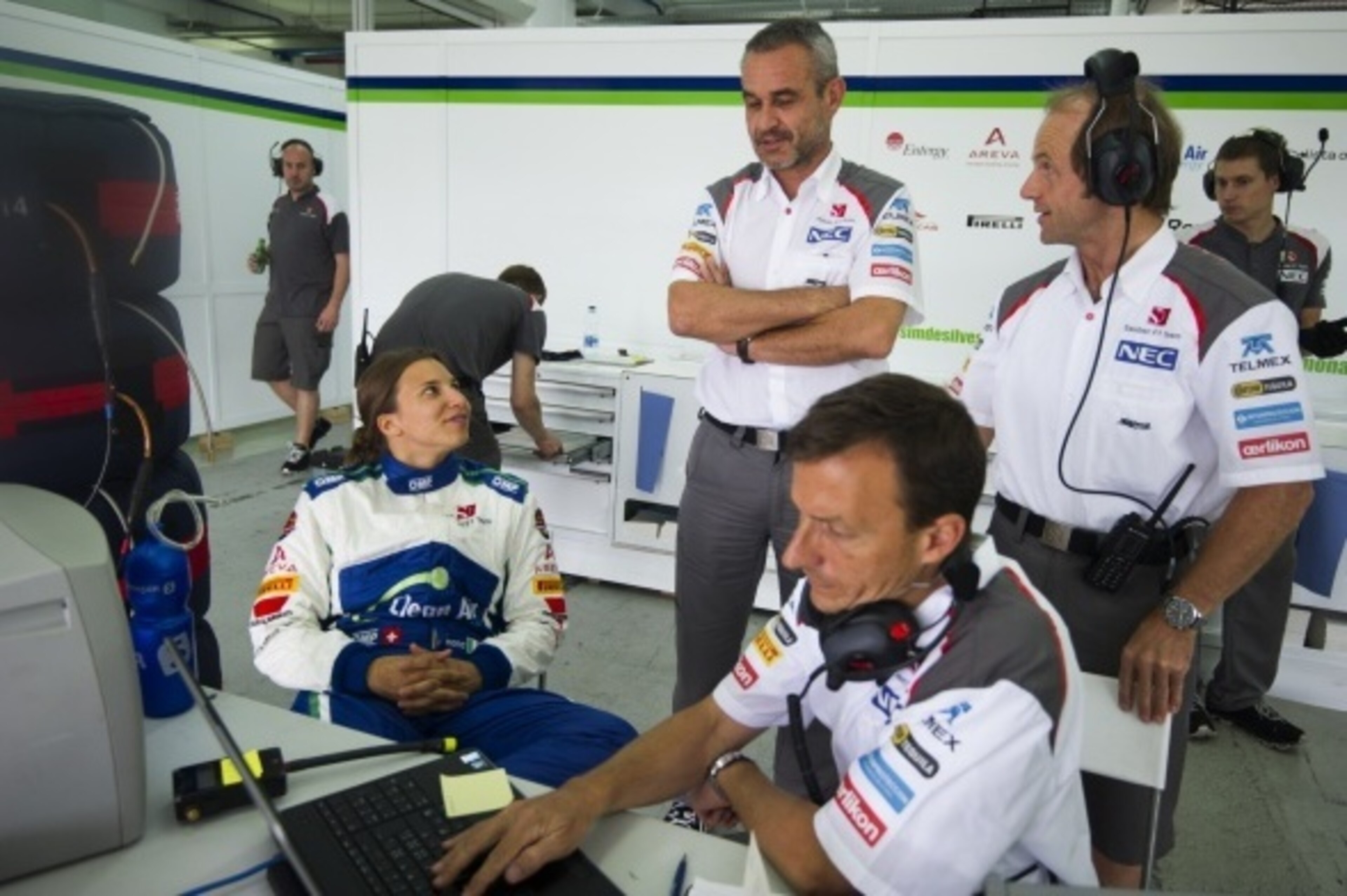 Sauber F1 Team's Swiss Formula One driver Simona de Silvestro speaks with mechanics during private test at the Ricardo Tormo racetrack in Valencia on June 26, 2014. AFP PHOTO / JOSE JORDAN (Photo credit should read JOSE JORDAN/AFP/Getty Images) Sauber F1 Team's Swiss Formula One driver Simona de Silvestro speaks with mechanics during private test at the Ricardo Tormo racetrack in Valencia on June 26, 2014. AFP PHOTO / JOSE JORDAN (Photo credit should read JOSE JORDAN/AFP/Getty Images)
