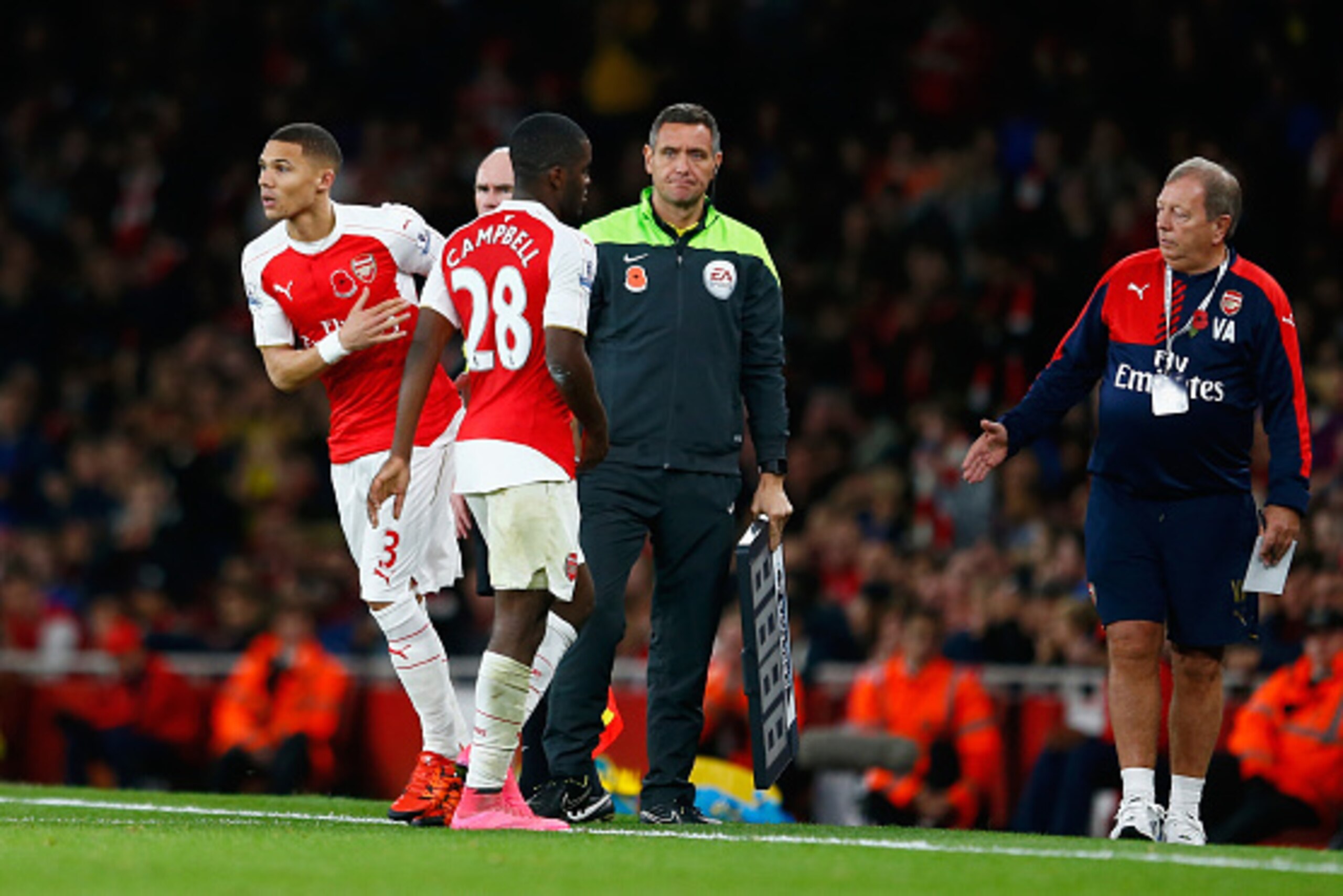 LONDON, ENGLAND - NOVEMBER 08:  Kieran Gibbs of Arsenal (L) comes on for Joel Campbell of Arsenal during the Barclays Premier League match between Arsenal and Tottenham Hotspur at the Emirates Stadium on November 8, 2015 in London, England.  (Photo by Jul