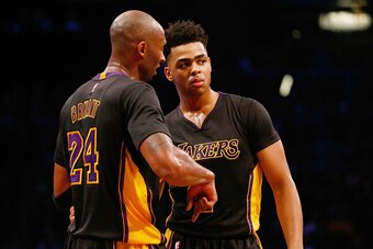 NEW YORK, NY - NOVEMBER 06:  Kobe Bryant #24 and D'Angelo Russell #1 of the Los Angeles Lakers talk during the game against the Brooklyn Nets at the Barclays Center on November 6, 2015 in the Brooklyn borough of New York City.  NOTE TO USER: User expressl