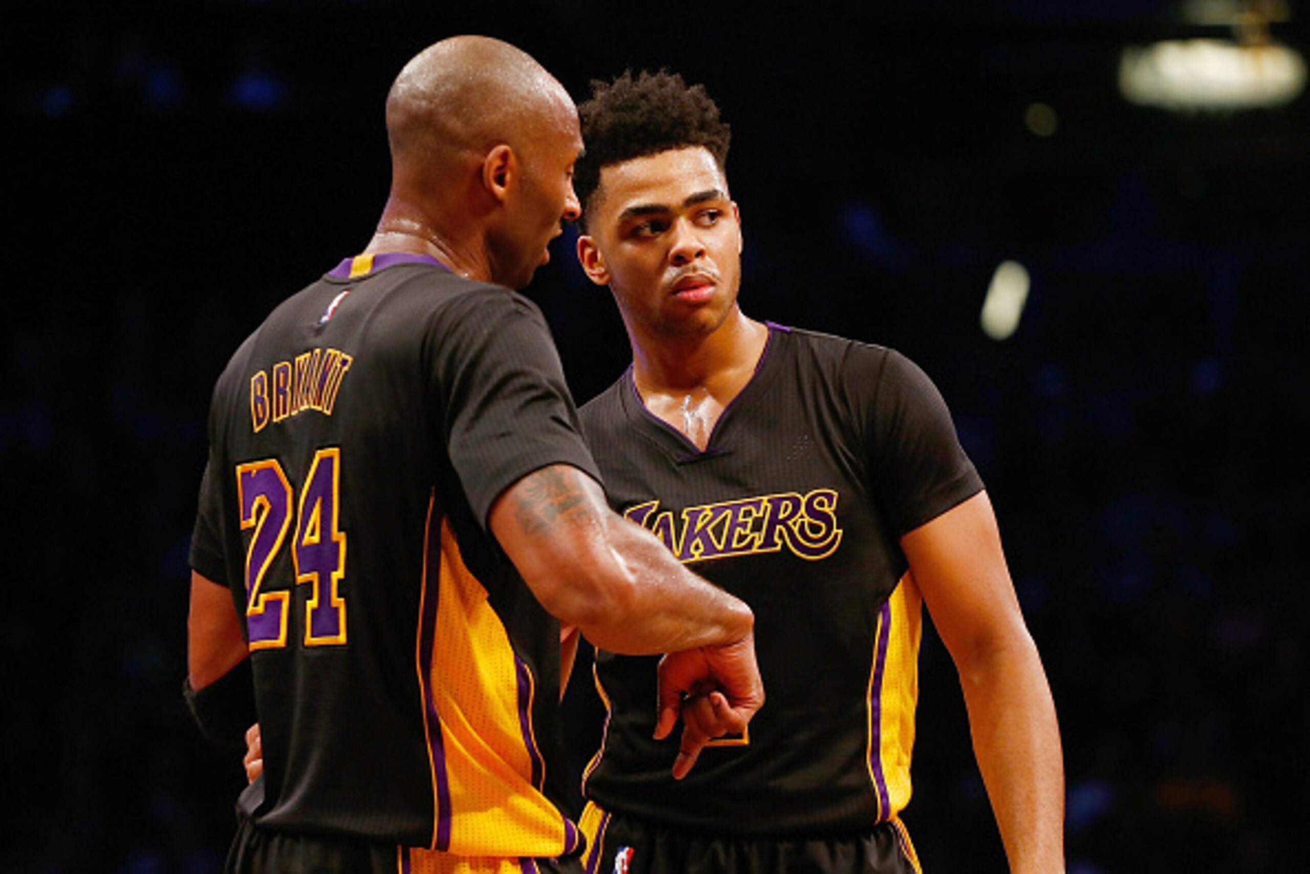 NEW YORK, NY - NOVEMBER 06:  Kobe Bryant #24 and D'Angelo Russell #1 of the Los Angeles Lakers talk during the game against the Brooklyn Nets at the Barclays Center on November 6, 2015 in the Brooklyn borough of New York City.  NOTE TO USER: User expressl