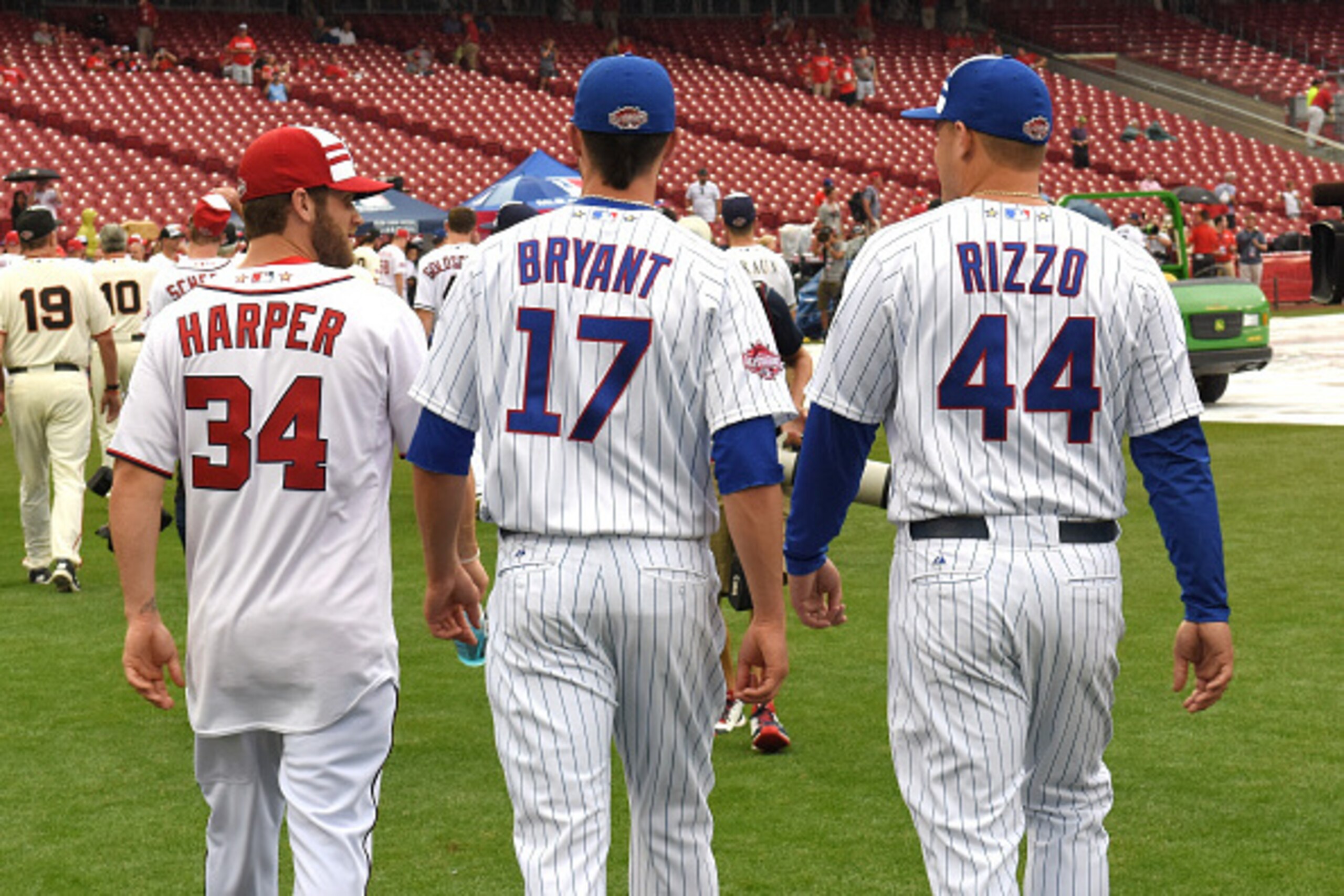 CINCINNATI, OH - JULY 14:  National League All-Stars Kris Bryant #17 and Anthony Rizzo #44 of the Chicago Cubs and Bryce Harper #34 of the Washington Nationals walk together on the field prior to the 86th MLB All-Star Game at Great American Ball Park on J