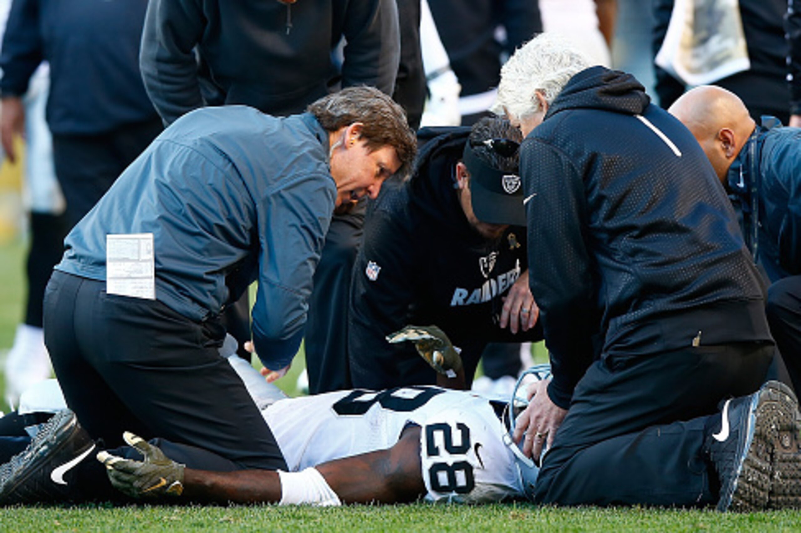 PITTSBURGH, PA - NOVEMBER 08:  Latavius Murray #28 of the Oakland Raiders lies on the ground injured on the field in the 3rd quarter of the game against the Pittsburgh Steelers at Heinz Field on November 8, 2015 in Pittsburgh, Pennsylvania.  (Photo by Jar