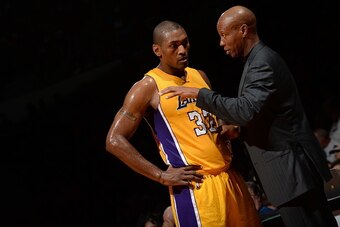 SAN DIEGO, CA - OCTOBER 17:  Head Coach Byron Scott of the Los Angeles Lakers talks with Metta World Peace #37 during the game against the Golden State Warriors during a preseason game on October 17, 2015 at Valley View Casino Center in San Diego, Califor