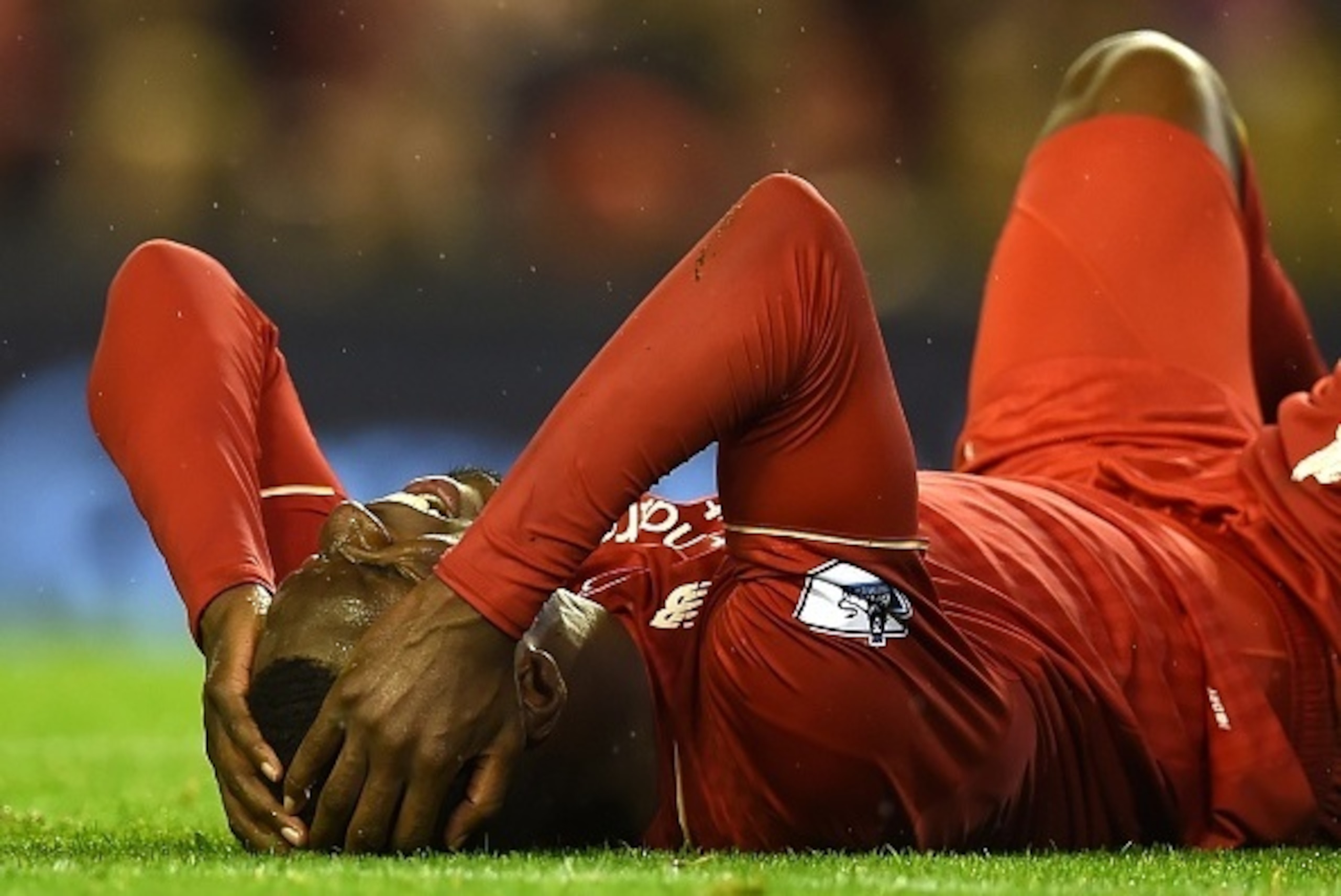 Liverpool's Zaire-born Belgian striker Christian Benteke reacts after missing a shot on goal during the English Premier League football match between Liverpool and Crystal Palace at the Anfield stadium in Liverpool, north-west England on November 8, 2015.