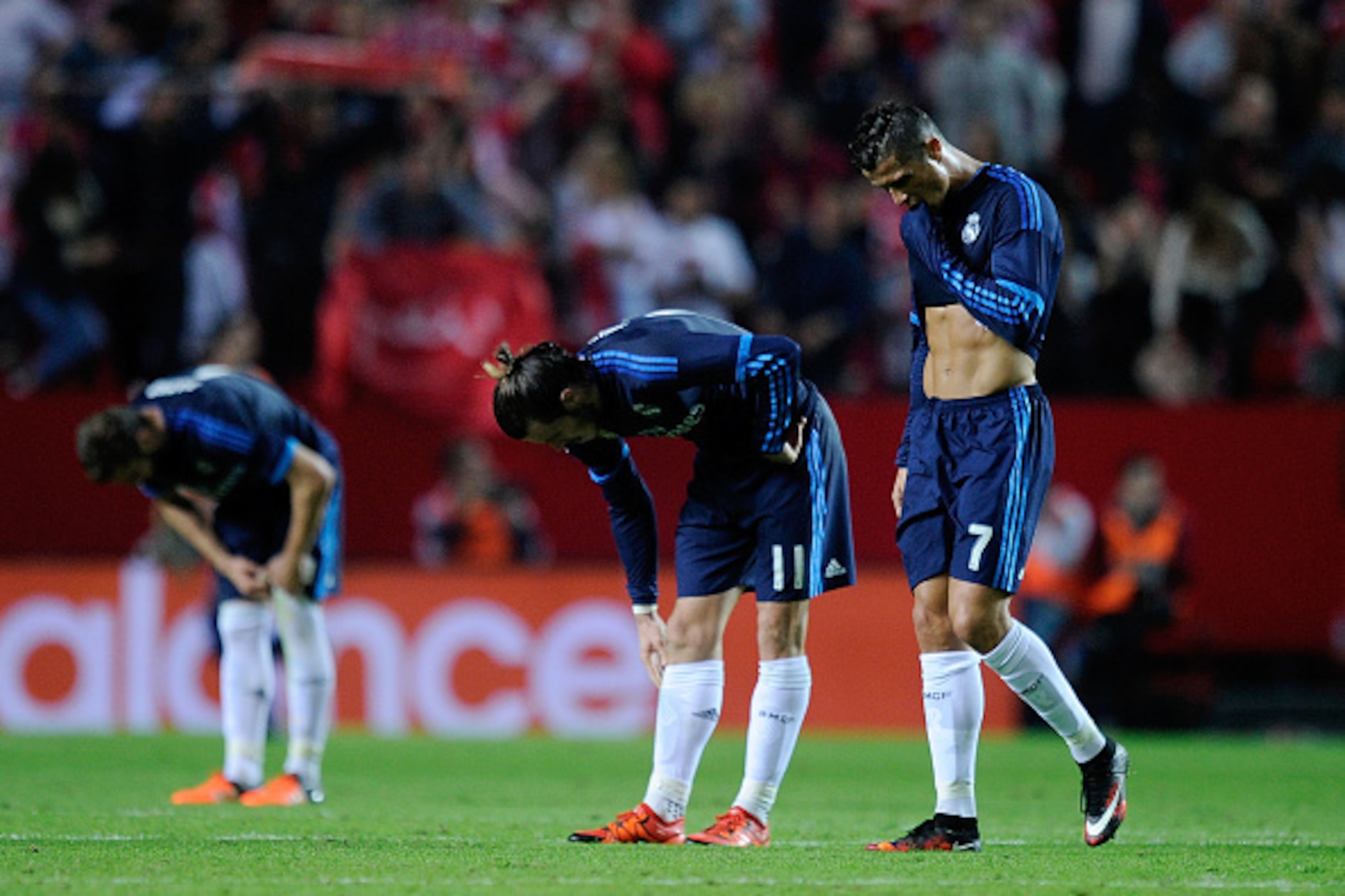 SEVILLE, SPAIN - NOVEMBER 08: Cristiano Ronaldo of Real Madrid leaves the field with Gareth Bale after losing 3-2 to Sevilla during the La Liga match between Sevilla FC and Real Madrid CF at Estadio Ramon Sanchez Pizjuan on November 8, 2015 in Seville, SEVILLE, SPAIN - NOVEMBER 08: Cristiano Ronaldo of Real Madrid leaves the field with Gareth Bale after losing 3-2 to Sevilla during the La Liga match between Sevilla FC and Real Madrid CF at Estadio Ramon Sanchez Pizjuan on November 8, 2015 in Seville,