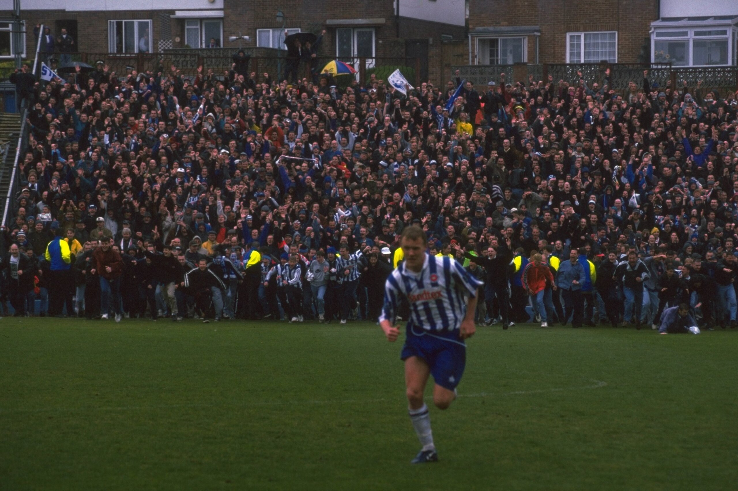 Fans invade the pitch after the last game played at the Goldstone Ground, in April 1997 Fans invade the pitch after the last game played at the Goldstone Ground, in April 1997