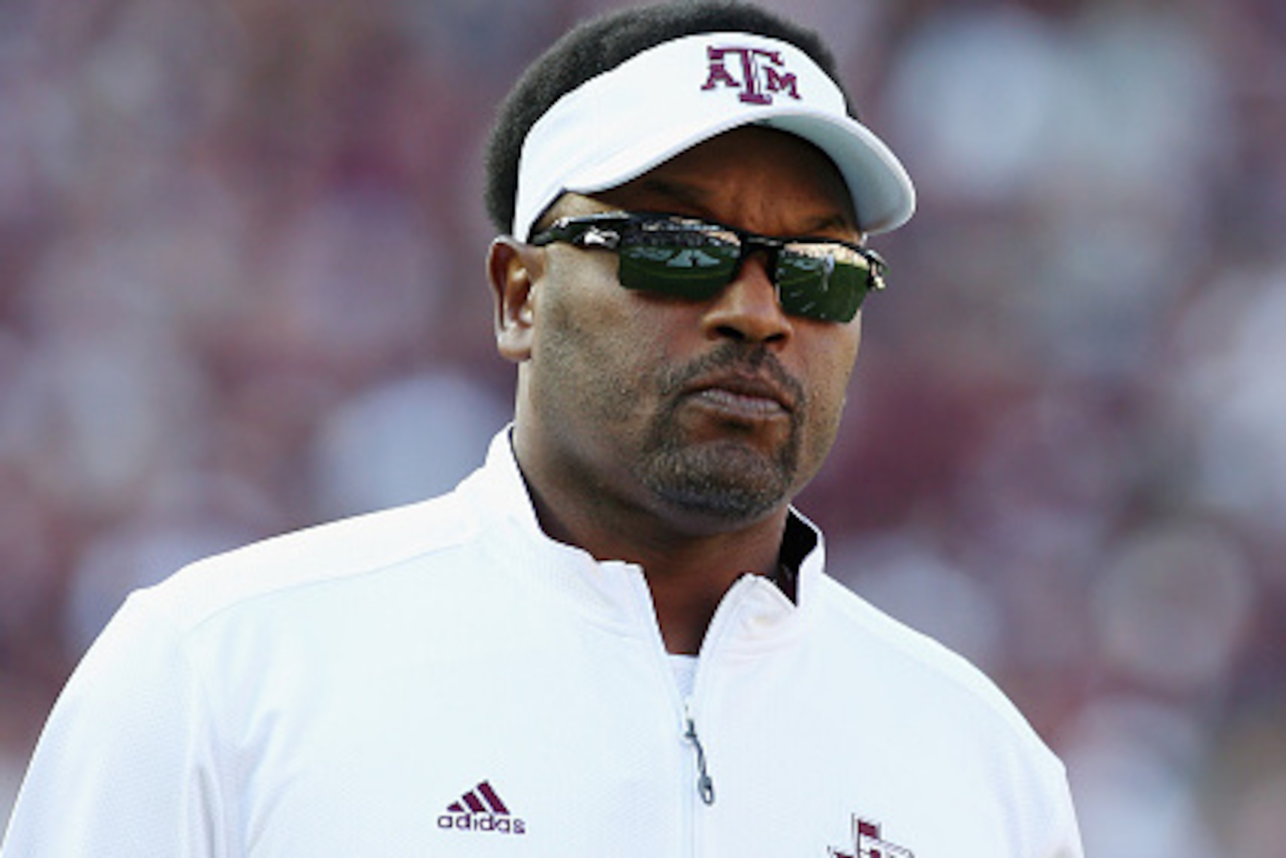 COLLEGE STATION, TX - SEPTEMBER 12:  Head coach Kevin Sumlin of the Texas A&M Aggies walks across the field before the start of their game against the Ball State Cardinals at Kyle Field on September 12, 2015 in College Station, Texas.  (Photo by Scott Hal