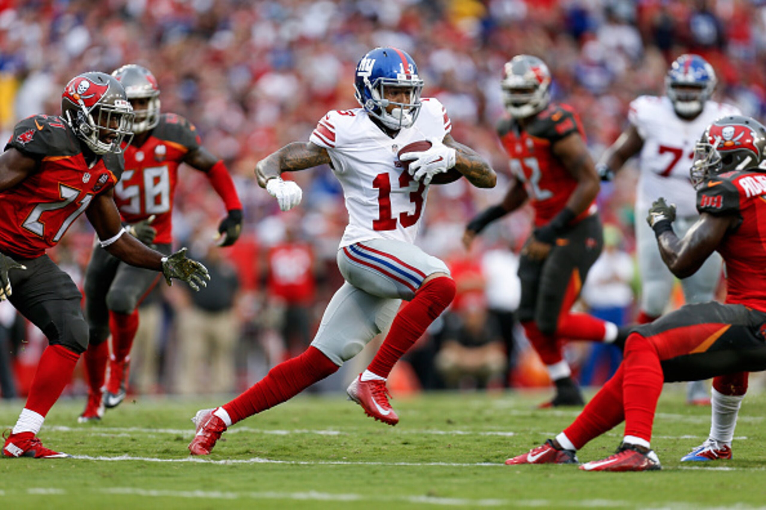 TAMPA, FL - NOVEMBER 8: Wide Receiver Odell Beckham, Jr. #13 of the New York Giants makes a catch and run during the game against the Tampa Bay Buccaneers at Raymond James Stadium on November 8, 2015 in Tampa, Florida. The Giants defeated the Buccaneers 3