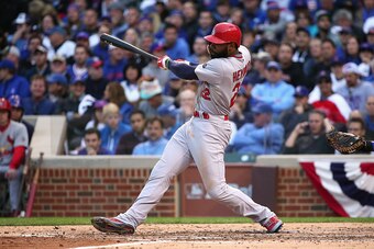 CHICAGO, IL - OCTOBER 13:  Jason Heyward #22 of the St. Louis Cardinals hits a single in the sixth inning against the Chicago Cubs during game four of the National League Division Series at Wrigley Field on October 13, 2015 in Chicago, Illinois.  (Photo b