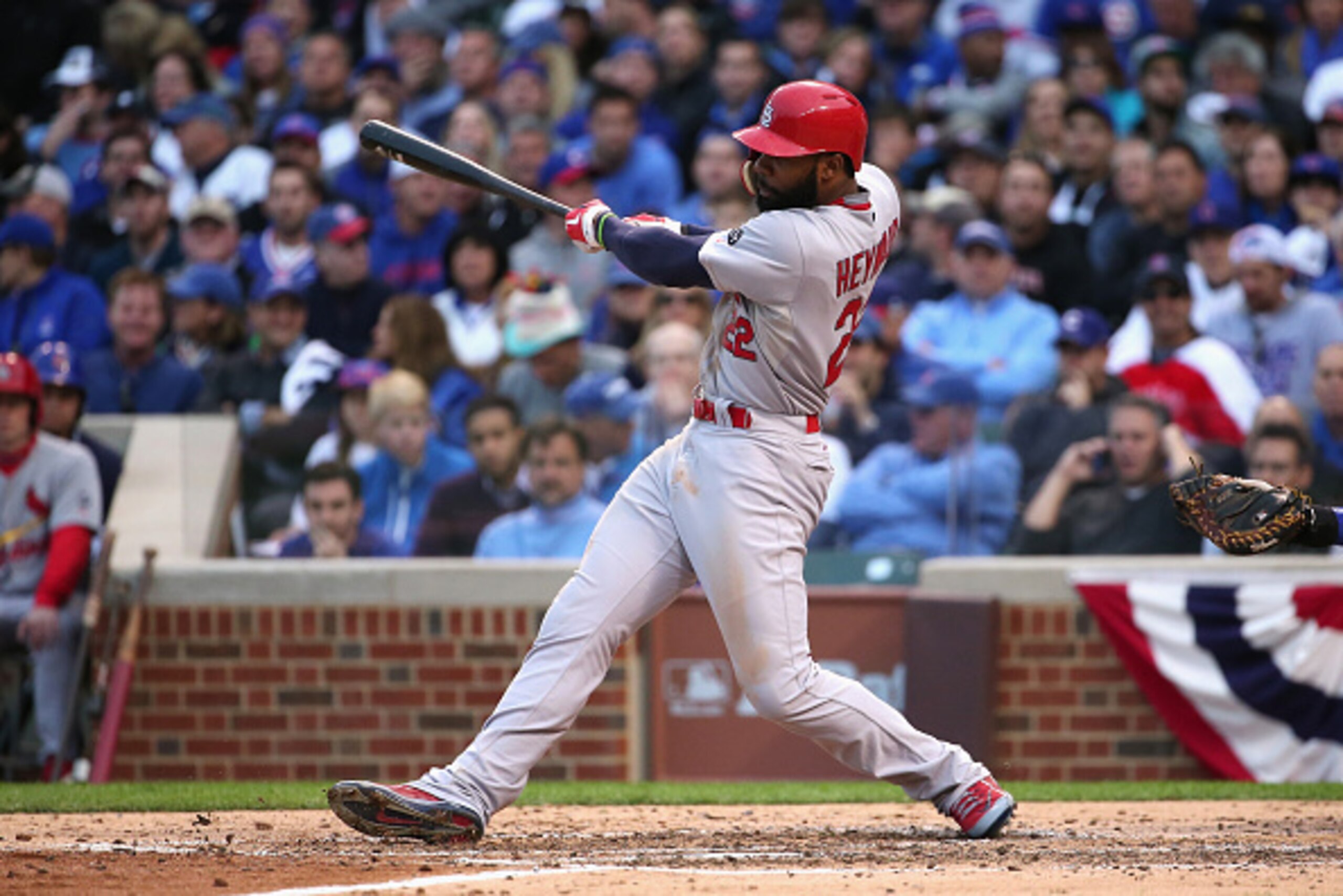 CHICAGO, IL - OCTOBER 13:  Jason Heyward #22 of the St. Louis Cardinals hits a single in the sixth inning against the Chicago Cubs during game four of the National League Division Series at Wrigley Field on October 13, 2015 in Chicago, Illinois.  (Photo b