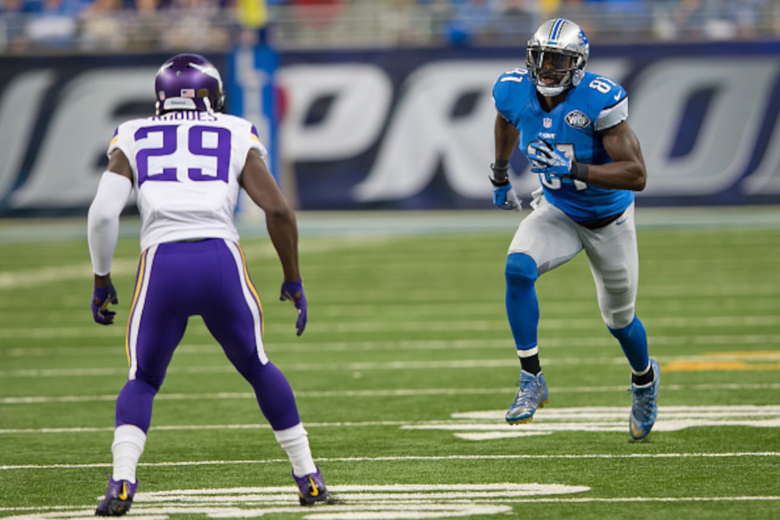 DETROIT, MI - OCTOBER 25: Calvin Johnson #81 of the Detroit Lions looks to avoid the cover by Xavier Rhodes #29 of the Minnesota Vikings in the second half during an NFL game at Ford Field on October 25, 2015 in Detroit, Michigan. The Vikings defeated the