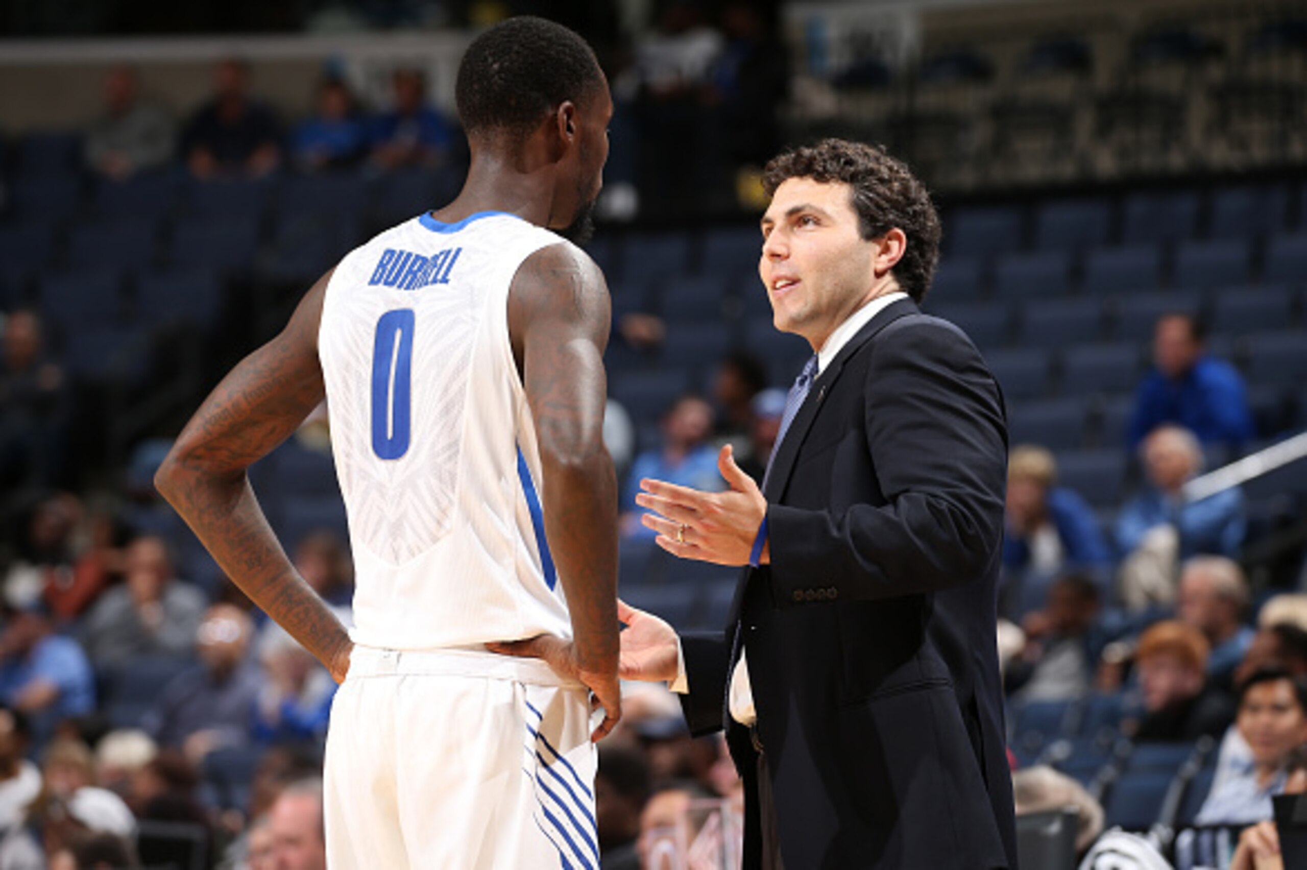 MEMPHIS, TN - NOVEMBER 6: Josh Pastner, head coach of the Memphis Tigers talks with Trahson Burrell #0 during a game against the LeMoyne-Owen Magicians on November 6, 2015 at FedExForum in Memphis, Tennessee. Memphis defeated LeMoyne Owen 107-88. (Photo b