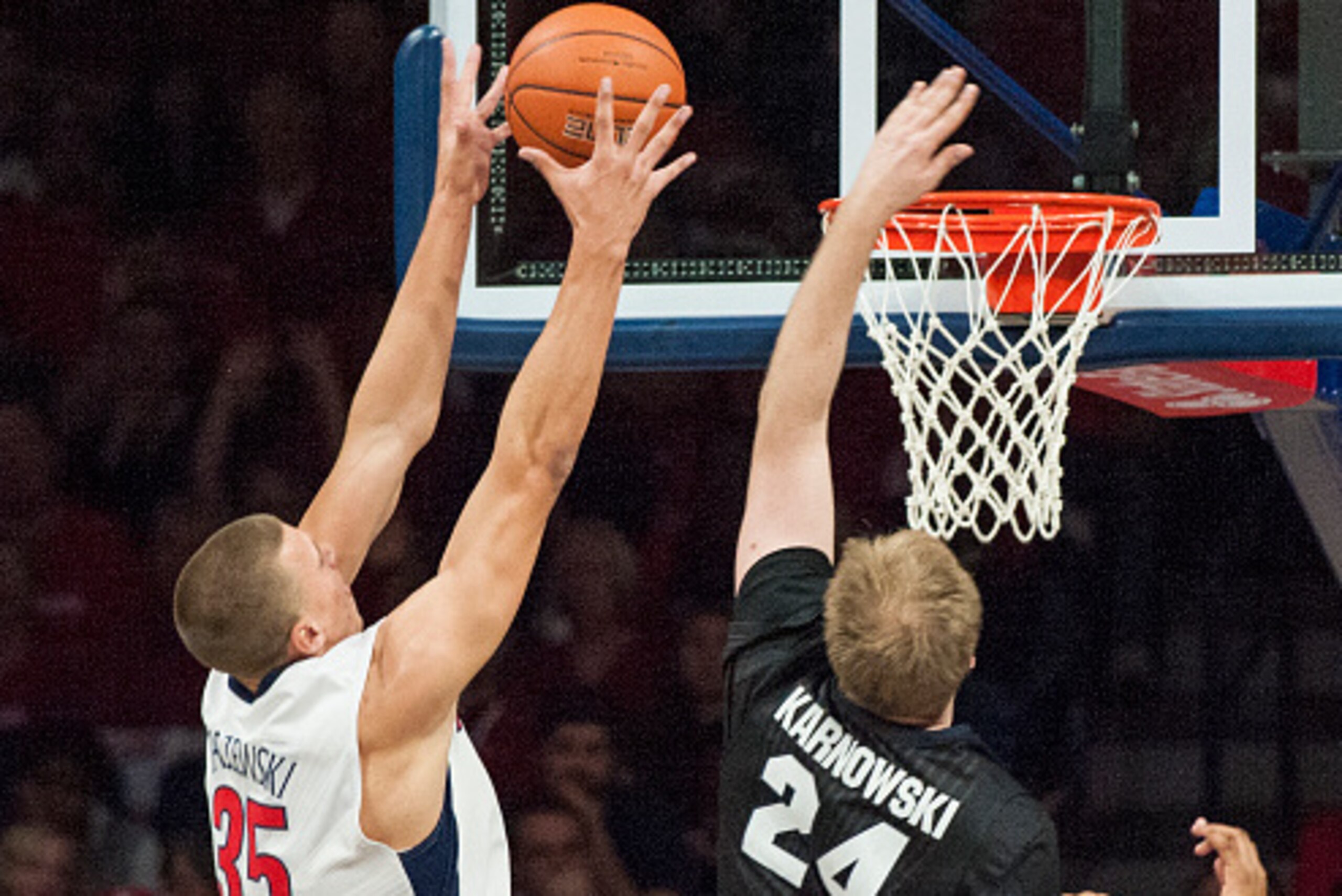 TUCSON, AZ - DECEMBER 6:  Center Kaleb Tarczewski #35 of the Arizona Wildcats gets the rebound from center Przemek Karnowski #24 of the Gonzaga Bulldogs at McKale Center on December 6, 2014 in Tucson, Arizona. (Photo by Bert Thomas/J and L Photography/Get