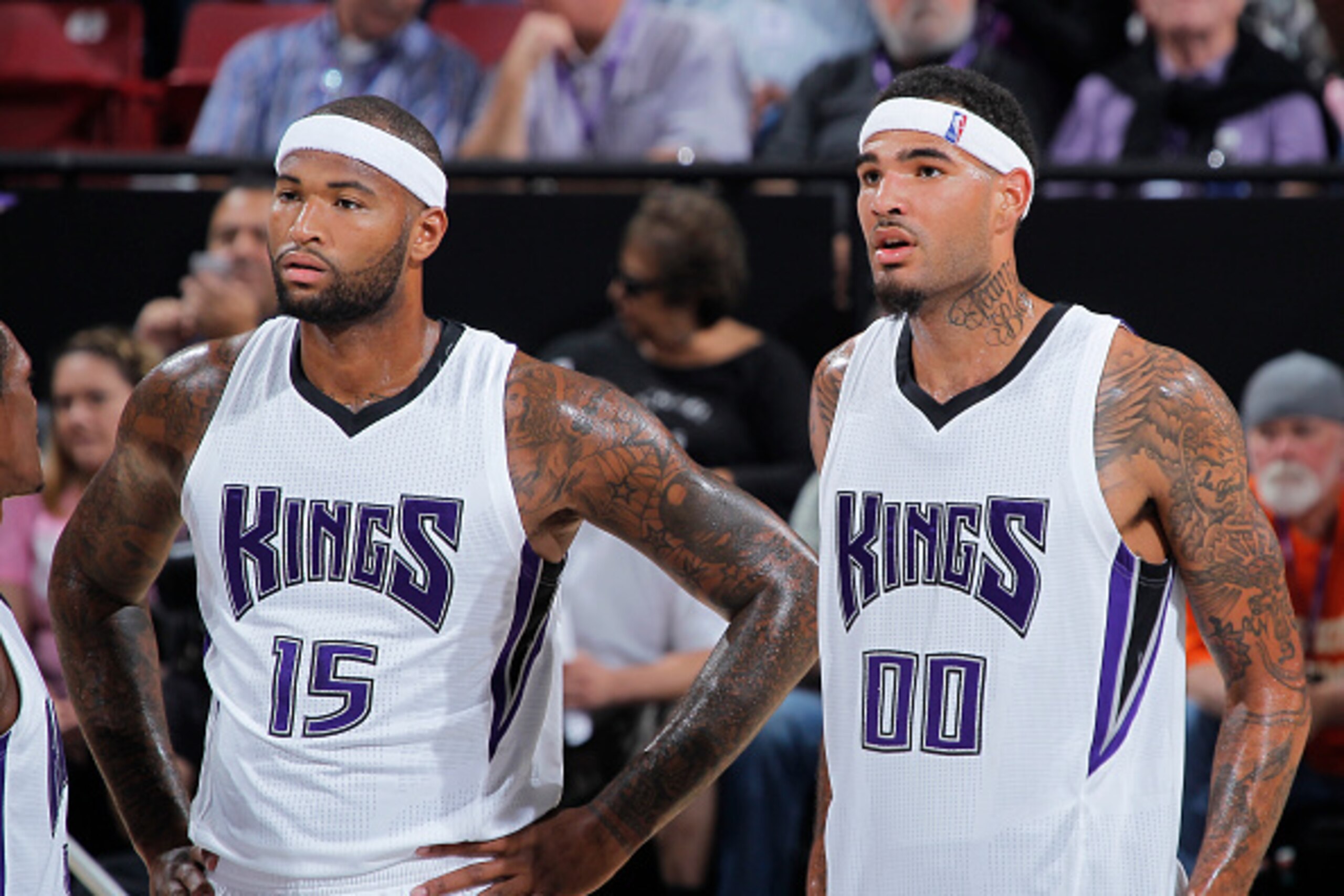 SACRAMENTO, CA - OCTOBER 8: DeMarcus Cousins #15 and Willie Cauley-Stein #00 of the Sacramento Kings look on against the San Antonio Spurs on October 8, 2015 at Sleep Train Arena in Sacramento, California. NOTE TO USER: User expressly acknowledges and agr