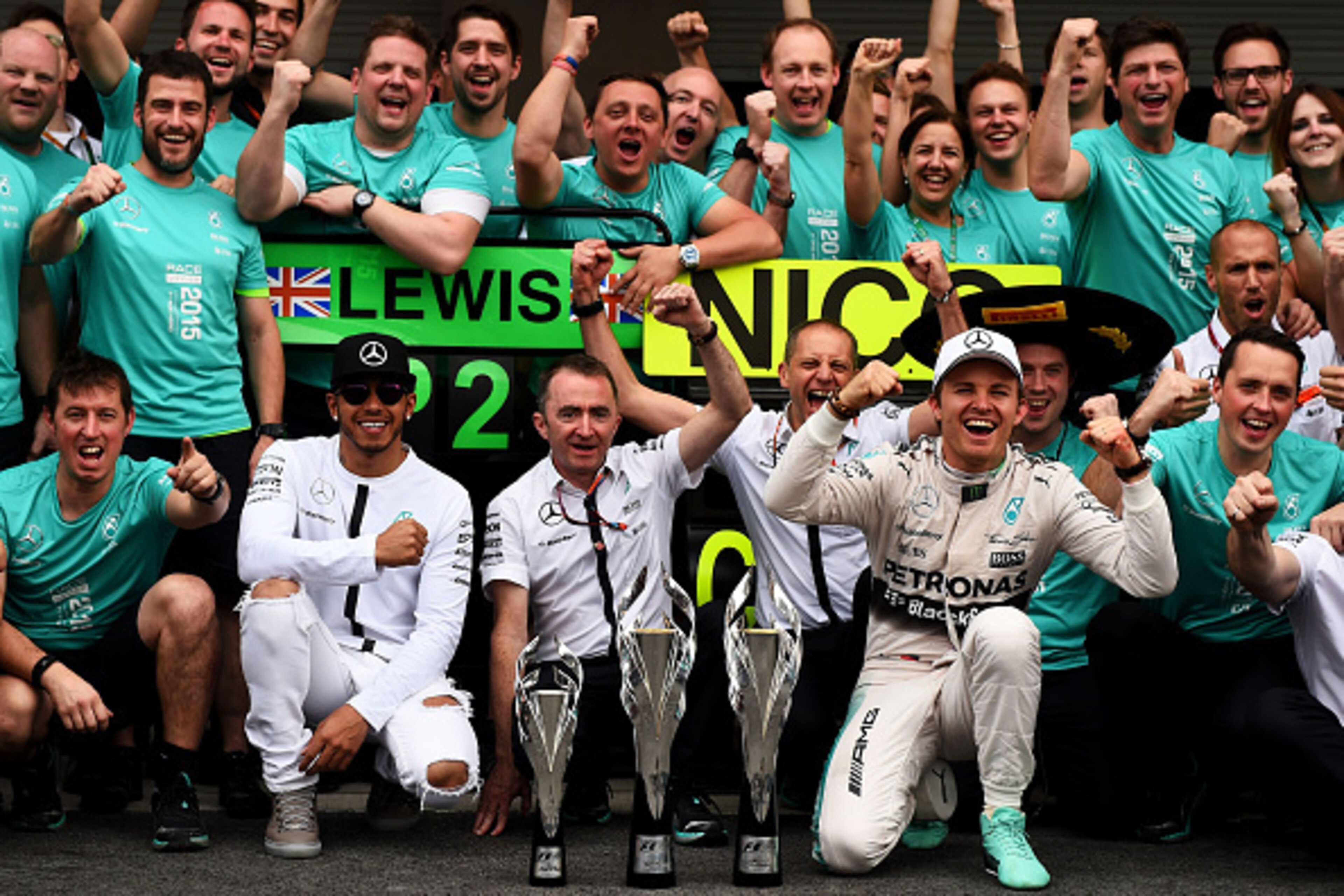 MEXICO CITY, MEXICO - NOVEMBER 01: Nico Rosberg of Germany and Mercedes GP celebrates with the team, including Lewis Hamilton of Great Britain and Mercedes GP, following his victory in the Formula One Grand Prix of Mexico at Autodromo Hermanos Rodriguez MEXICO CITY, MEXICO - NOVEMBER 01: Nico Rosberg of Germany and Mercedes GP celebrates with the team, including Lewis Hamilton of Great Britain and Mercedes GP, following his victory in the Formula One Grand Prix of Mexico at Autodromo Hermanos Rodriguez