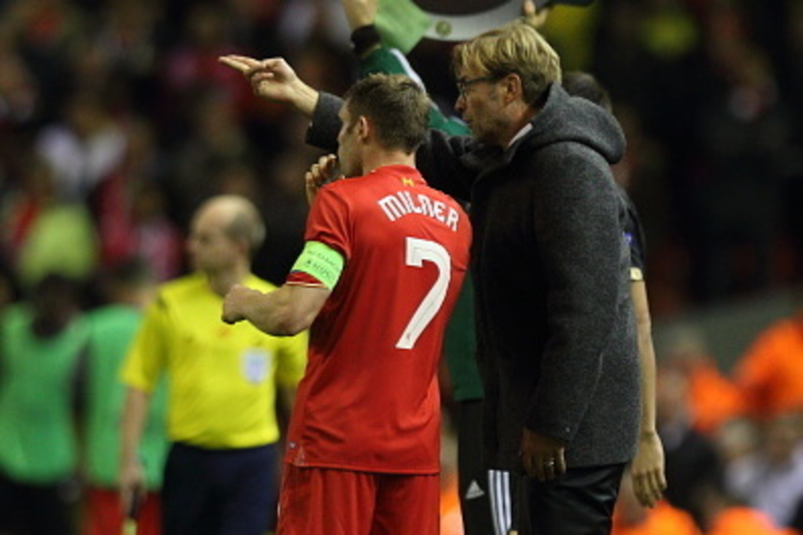 LIVERPOOL, ENGLAND - OCTOBER 22:  Jurgen Klopp the manager of Liverpool on the sidelines chatting to James Milner during the UEFA Europa League match between Liverpool and Rubin Kazan at Anfield on October 22, 2015 in Liverpool, United Kingdom.  (Photo by