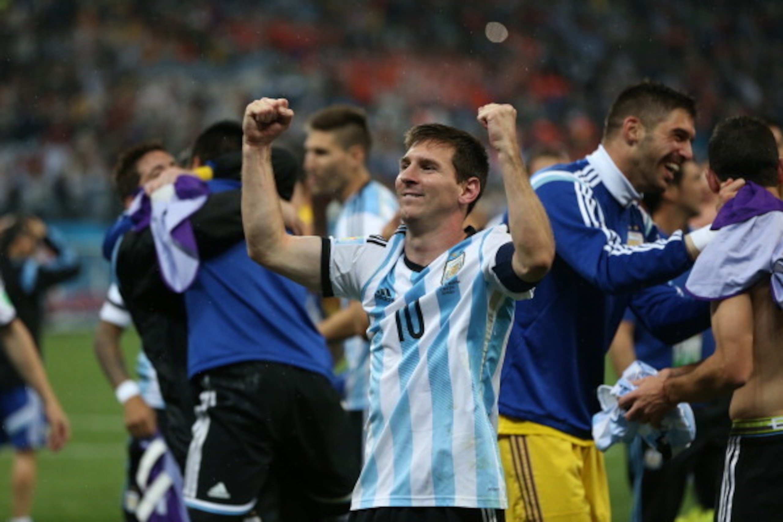 SAO PAULO, BRAZIL - JULY 09:  Lionel Messi of Argentina celebrates after a victory on penalties during the 2014 FIFA World Cup Brazil Semi Final match between Netherlands and Argentina at The Arena de Sao Paulo on July 09, 2014 in Sao Paulo, Brazil. (Phot