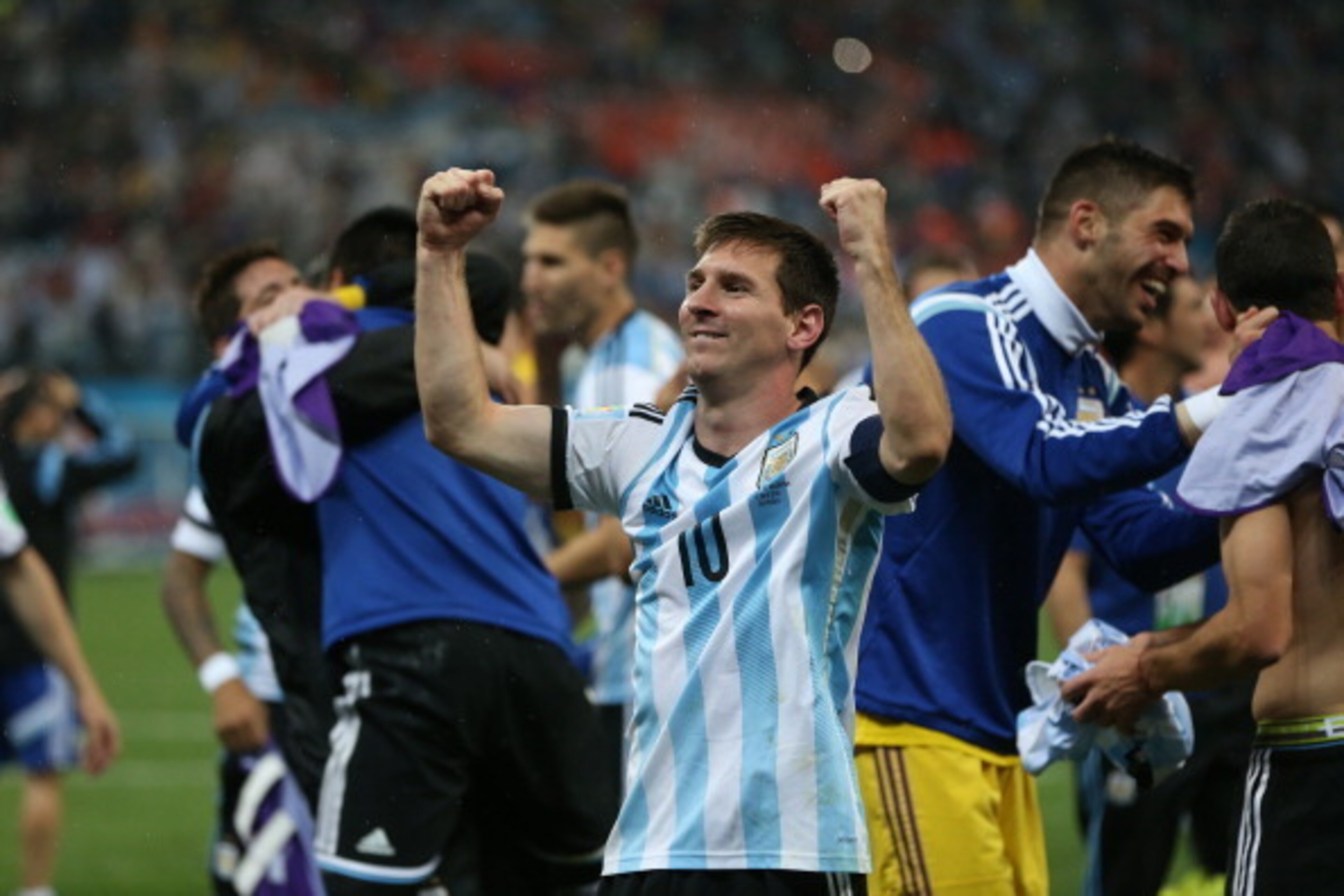 SAO PAULO, BRAZIL - JULY 09:  Lionel Messi of Argentina celebrates after a victory on penalties during the 2014 FIFA World Cup Brazil Semi Final match between Netherlands and Argentina at The Arena de Sao Paulo on July 09, 2014 in Sao Paulo, Brazil. (Phot