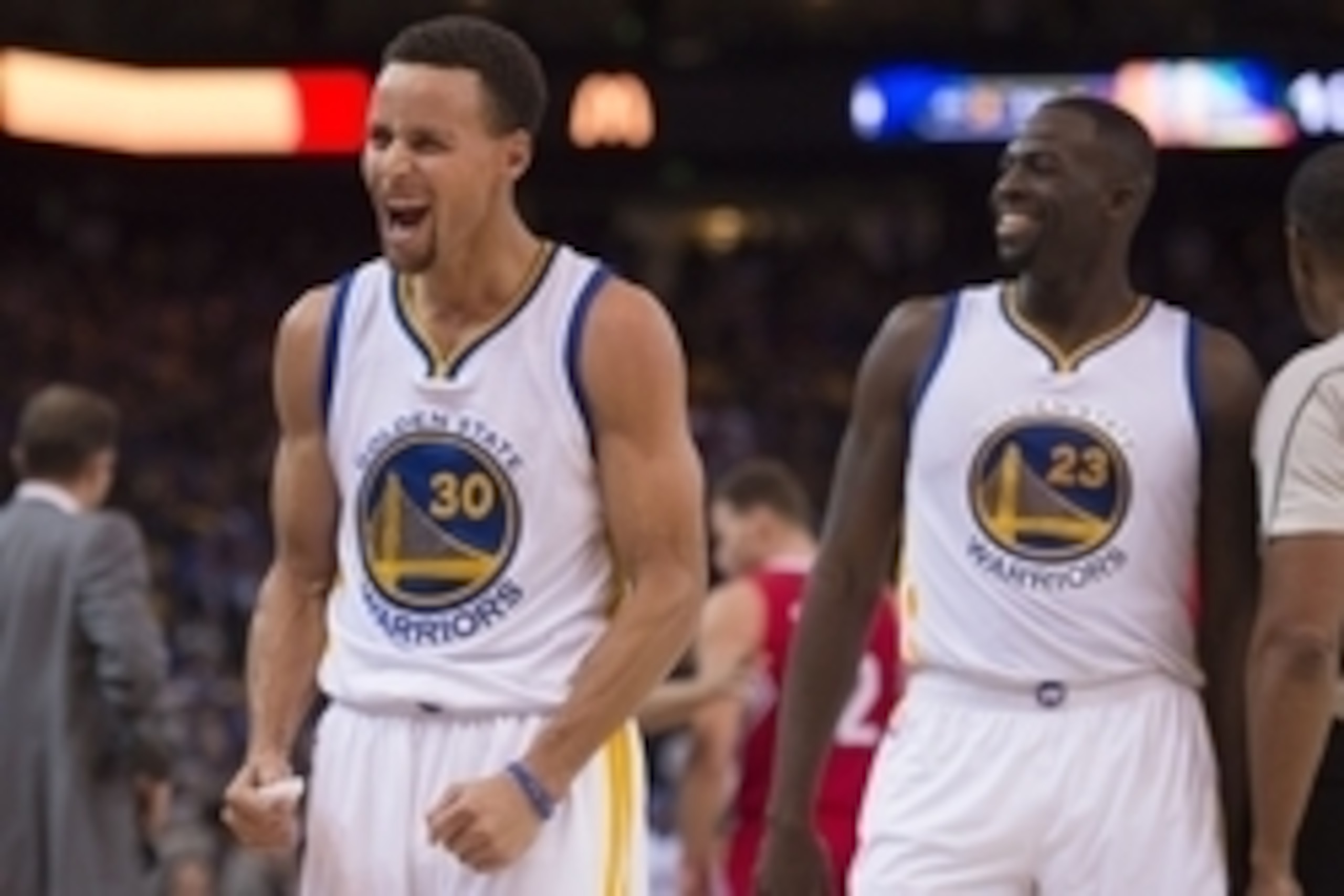 November 4, 2015; Oakland, CA, USA; Golden State Warriors guard Stephen Curry (30) and forward Draymond Green (23) celebrate during the fourth quarter against the Los Angeles Clippers at Oracle Arena. The Warriors defeated the Clippers 112-108. Mandatory 
