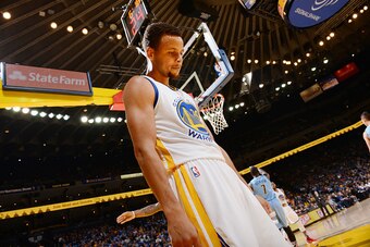 OAKLAND, CA - NOVEMBER 6: Stephen Curry #30 of the Golden State Warriors in a game against the Denver Nuggets on November 6, 2015 at Oracle Arena in Oakland, California. NOTE TO USER: User expressly acknowledges and agrees that, by downloading and or usin