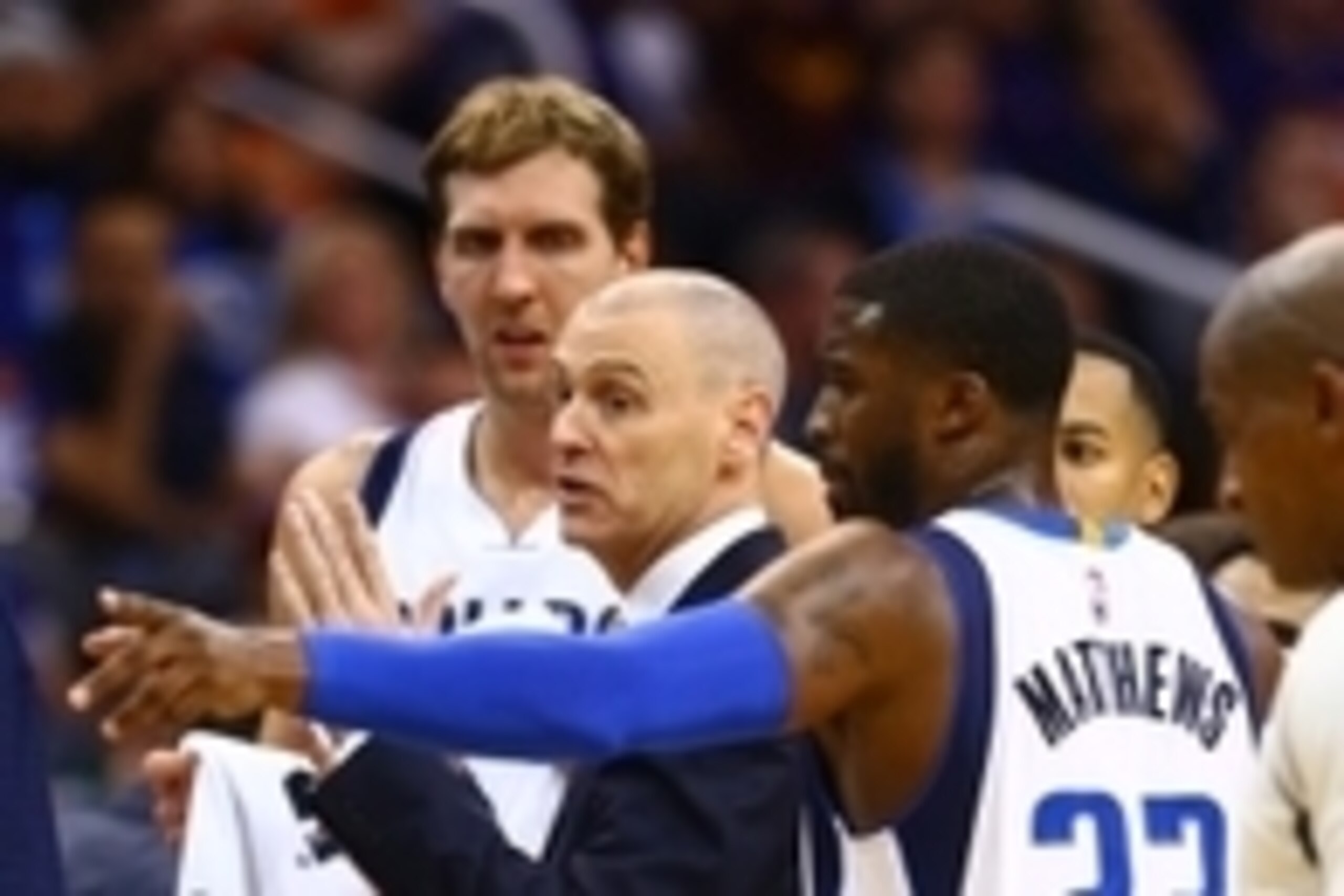 Oct 28, 2015; Phoenix, AZ, USA; Dallas Mavericks guard Wesley Matthews (23) and forward Dirk Nowitzki (left) talk to head coach Rick Carlisle in the huddle against the Phoenix Suns in the season opener at Talking Stick Resort Arena. Mandatory Credit: Mark Oct 28, 2015; Phoenix, AZ, USA; Dallas Mavericks guard Wesley Matthews (23) and forward Dirk Nowitzki (left) talk to head coach Rick Carlisle in the huddle against the Phoenix Suns in the season opener at Talking Stick Resort Arena. Mandatory Credit: Mark