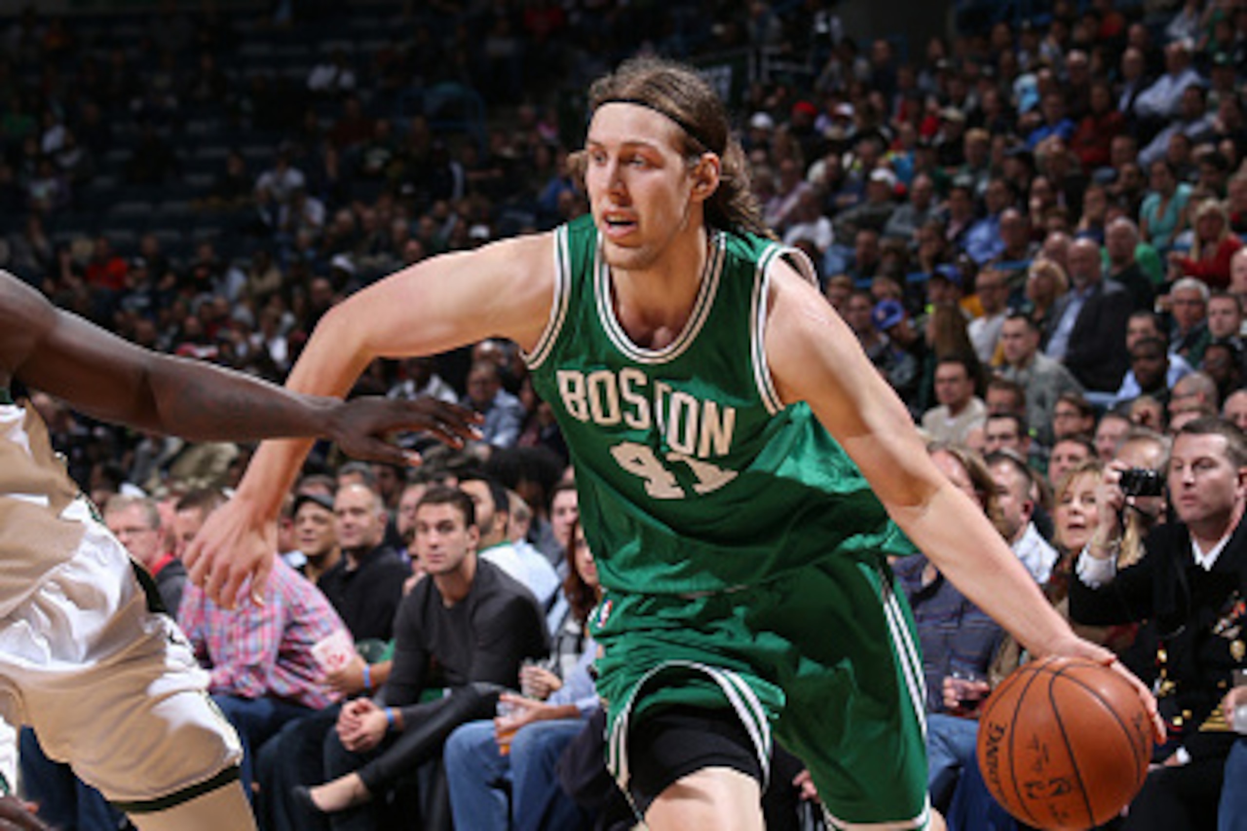 MILWAUKEE, WI - NOVEMBER 10:  Kelly Olynyk #41 of the Boston Celtics drives to the basket against the Milwaukee Bucks on November 10, 2015 at the BMO Harris Bradley Center in Milwaukee, Wisconsin. NOTE TO USER: User expressly acknowledges and agrees that,