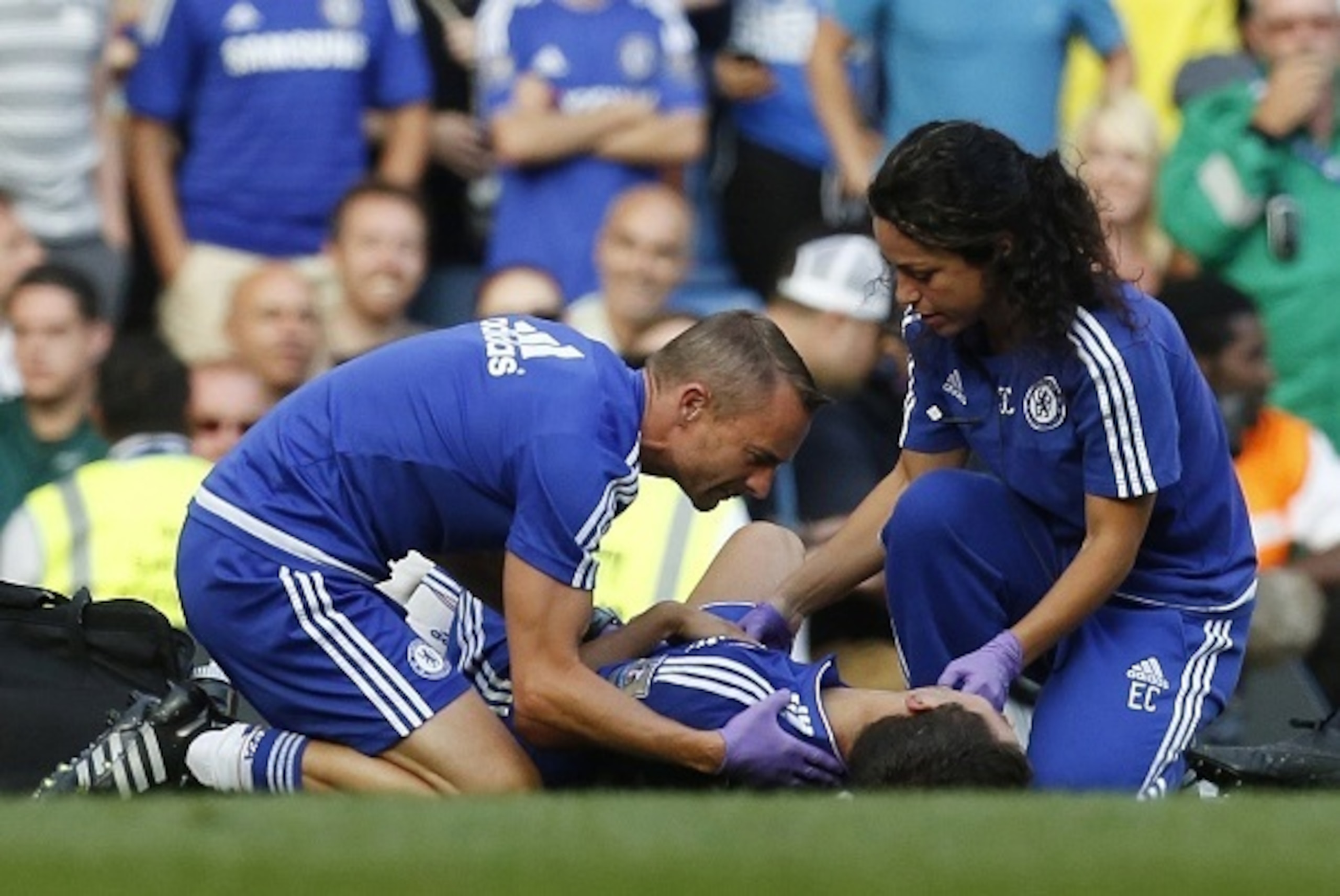 Chelsea doctor (R) Eva Carneiro and head physio Jon Fearn (L) treat Chelsea's Belgian midfielder Eden Hazard late on during the English Premier League football match between Chelsea and Swansea City at Stamford Bridge in London on August 8, 2015. Chelsea Chelsea doctor (R) Eva Carneiro and head physio Jon Fearn (L) treat Chelsea's Belgian midfielder Eden Hazard late on during the English Premier League football match between Chelsea and Swansea City at Stamford Bridge in London on August 8, 2015. Chelsea