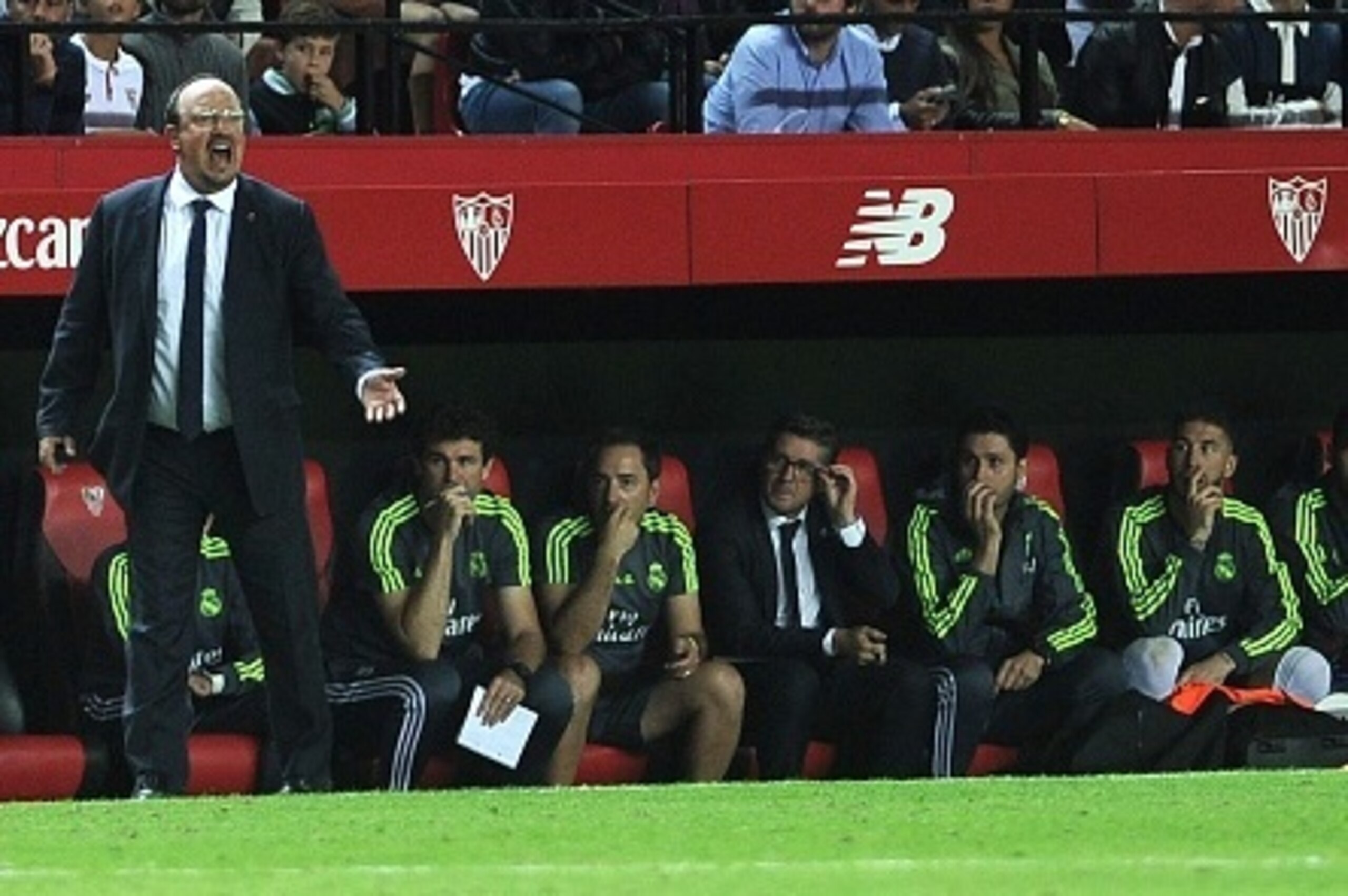 Real Madrid's coach Rafael Benitez (L) gestures during the Spanish league football match Sevilla FC vs Real Madrid CF at the Ramon Sanchez Pizjuan stadium in Sevilla on November 8, 2015. AFP PHOTO/ CRISTINA QUICLER (Photo credit should read CRIST Real Madrid's coach Rafael Benitez (L) gestures during the Spanish league football match Sevilla FC vs Real Madrid CF at the Ramon Sanchez Pizjuan stadium in Sevilla on November 8, 2015. AFP PHOTO/ CRISTINA QUICLER (Photo credit should read CRIST