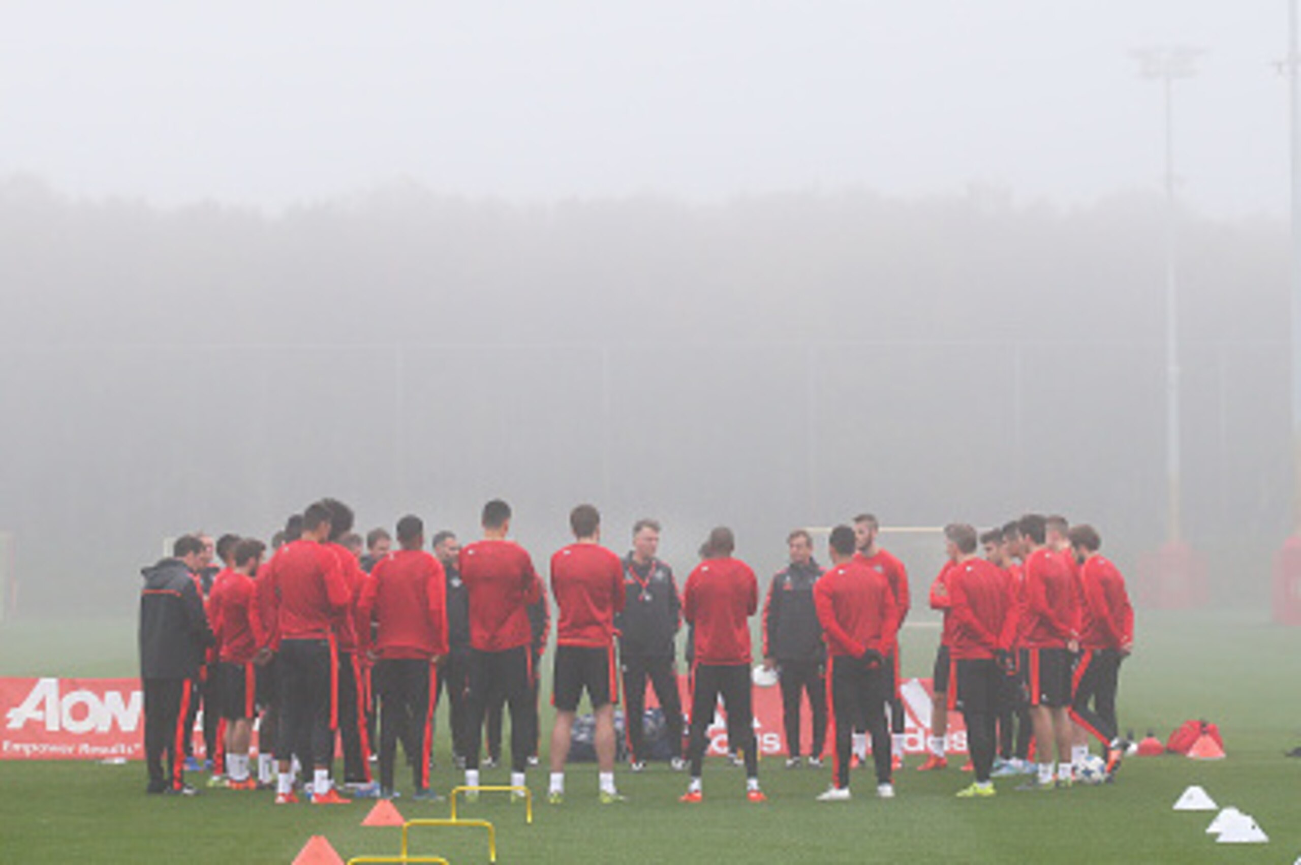 MANCHESTER, ENGLAND - NOVEMBER 02:  Louis van Gaal the manager of Manchester United talks with his players prior to a Manchester United training session on the eve of the UEFA Champions League Group B match against CSKA Moscow at Aon Training Complex on N