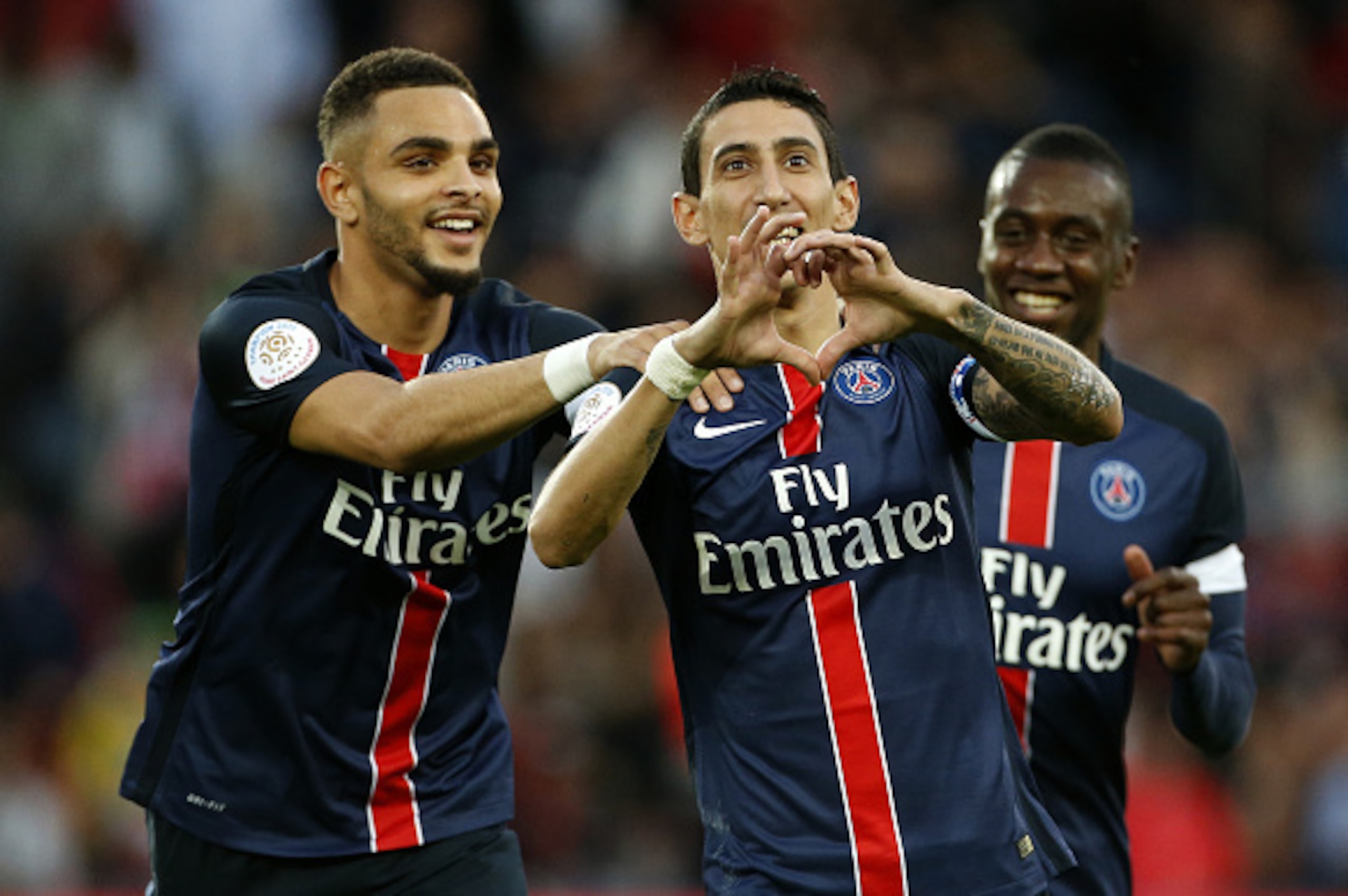 PARIS, FRANCE - NOVEMBER 7: Angel Di Maria of PSG celebrates scoring the first goal with Layvin Kurzawa and Blaise Matuidi of PSG during the French Ligue 1 match between Paris Saint-Germain (PSG) and Toulouse FC (TFC) at Parc des Princes stadium on Novemb PARIS, FRANCE - NOVEMBER 7: Angel Di Maria of PSG celebrates scoring the first goal with Layvin Kurzawa and Blaise Matuidi of PSG during the French Ligue 1 match between Paris Saint-Germain (PSG) and Toulouse FC (TFC) at Parc des Princes stadium on Novemb