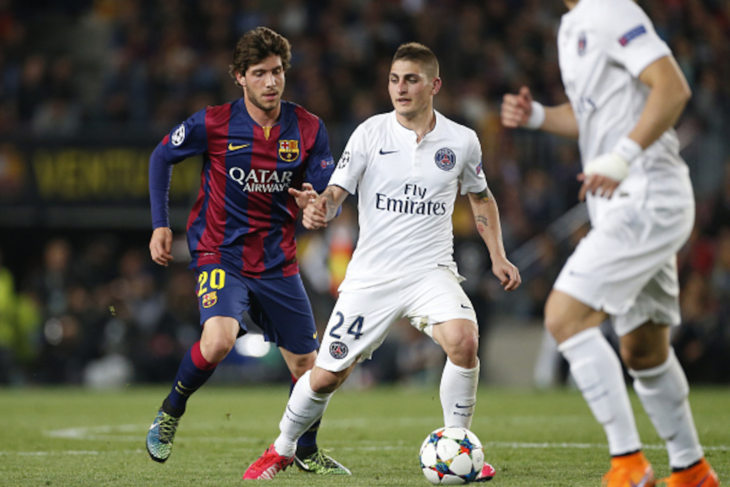 BARCELONA, SPAIN - APRIL 21: Sergi Roberto of Barcelona and Marco Verratti of PSG in action during the UEFA Champions League quarter final second leg match between FC Barcelona and Paris Saint-Germain (PSG) at Camp Nou stadium on April 21, 2015 in Barcelo BARCELONA, SPAIN - APRIL 21: Sergi Roberto of Barcelona and Marco Verratti of PSG in action during the UEFA Champions League quarter final second leg match between FC Barcelona and Paris Saint-Germain (PSG) at Camp Nou stadium on April 21, 2015 in Barcelo